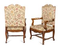 A Set of Six Régence Style Carved Walnut Fauteuils