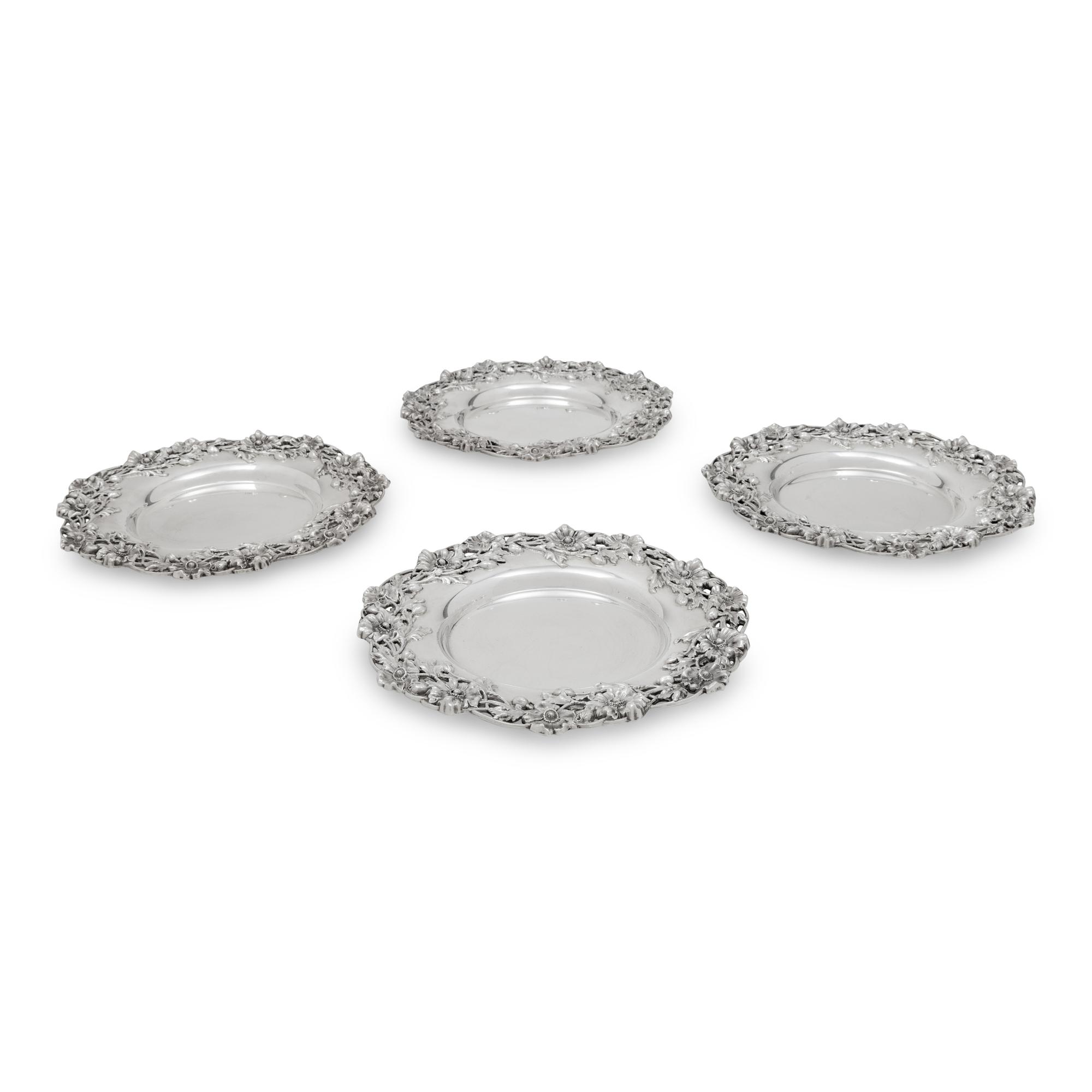 A Set of Eleven American Silver Bread Plates
