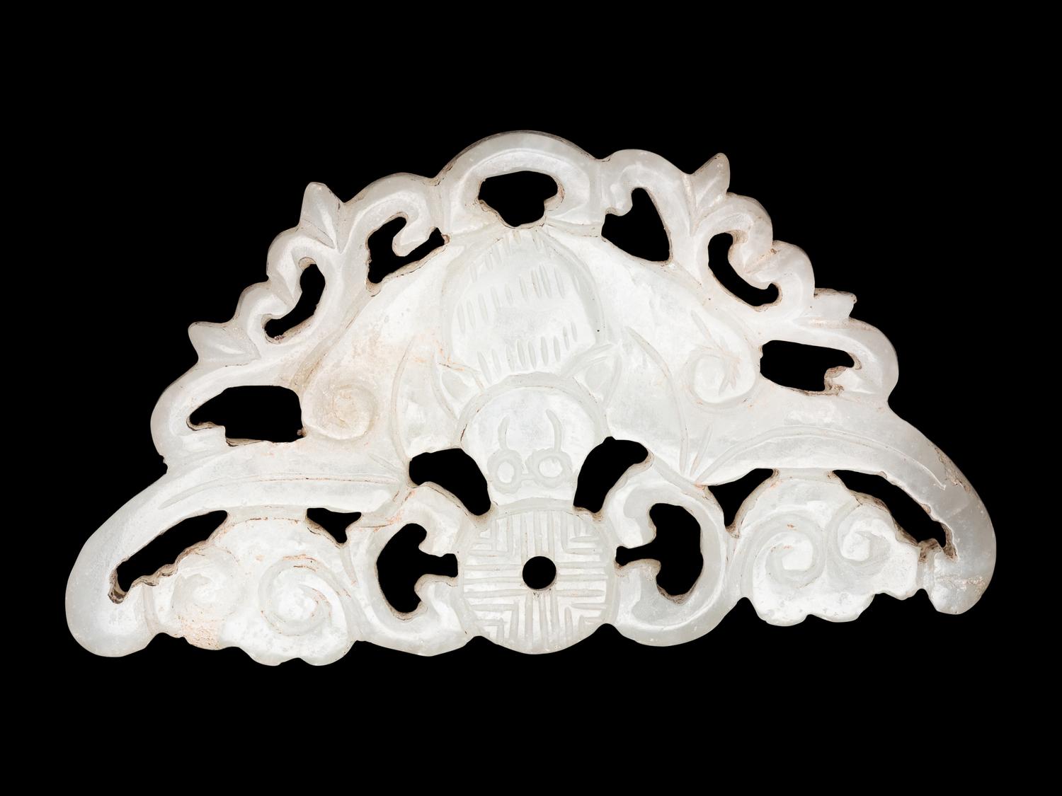 Three Chinese Pale Celadon Jade Reticulated Flori-Form Pendants