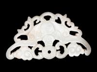 Three Chinese Pale Celadon Jade Reticulated Flori-Form Pendants