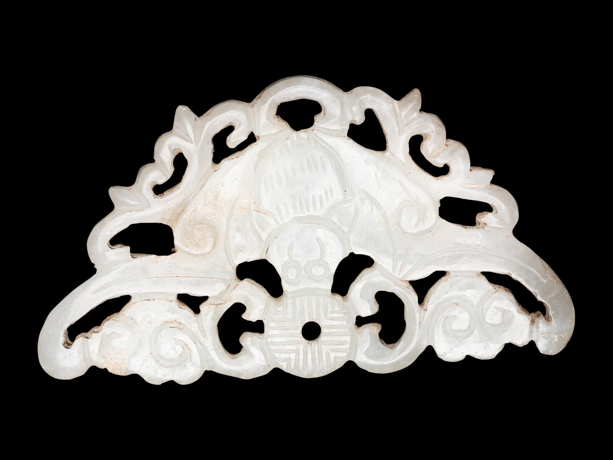 Three Chinese Pale Celadon Jade Reticulated Flori-Form Pendants