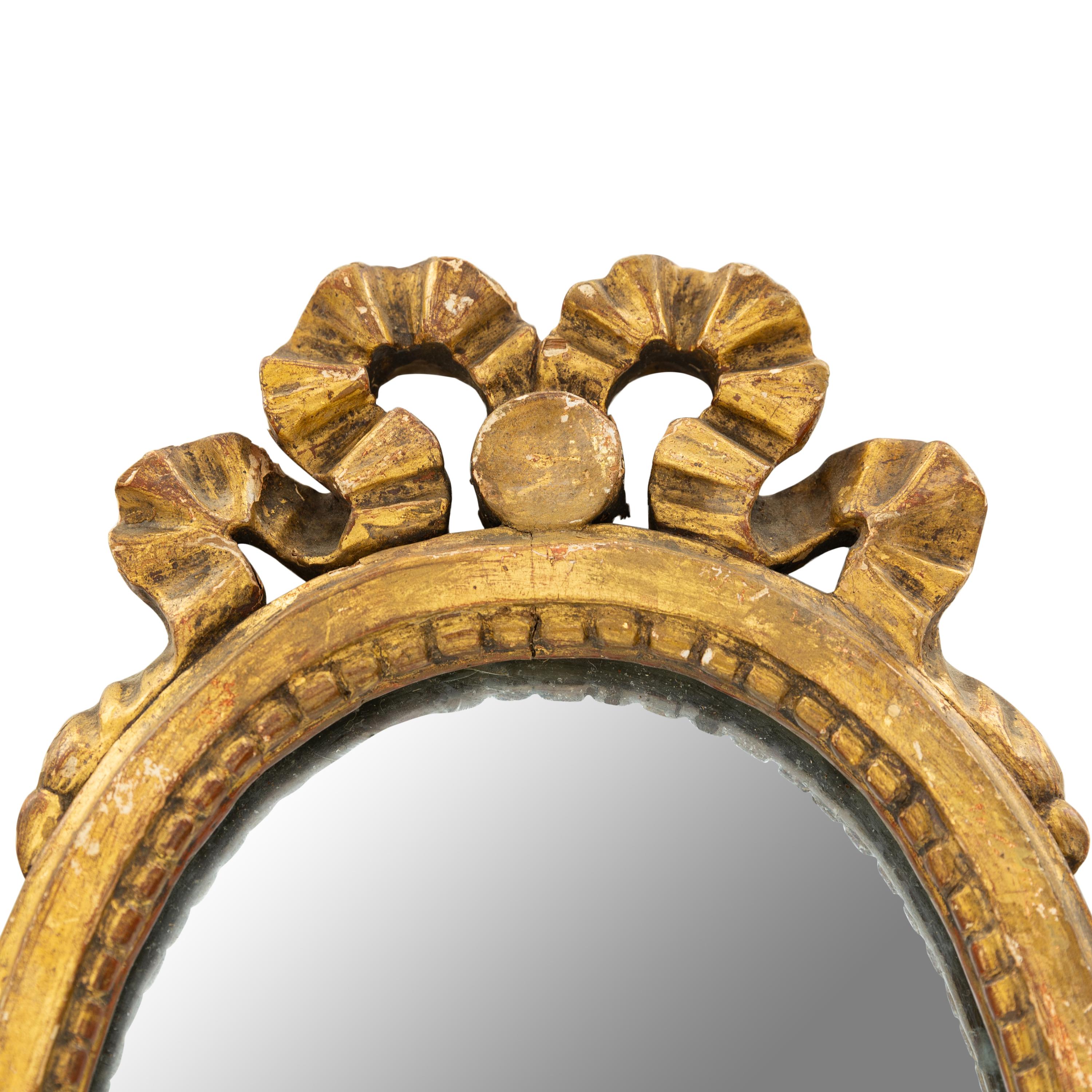 A Pair of George III Style Giltwood Diminutive Mirrors