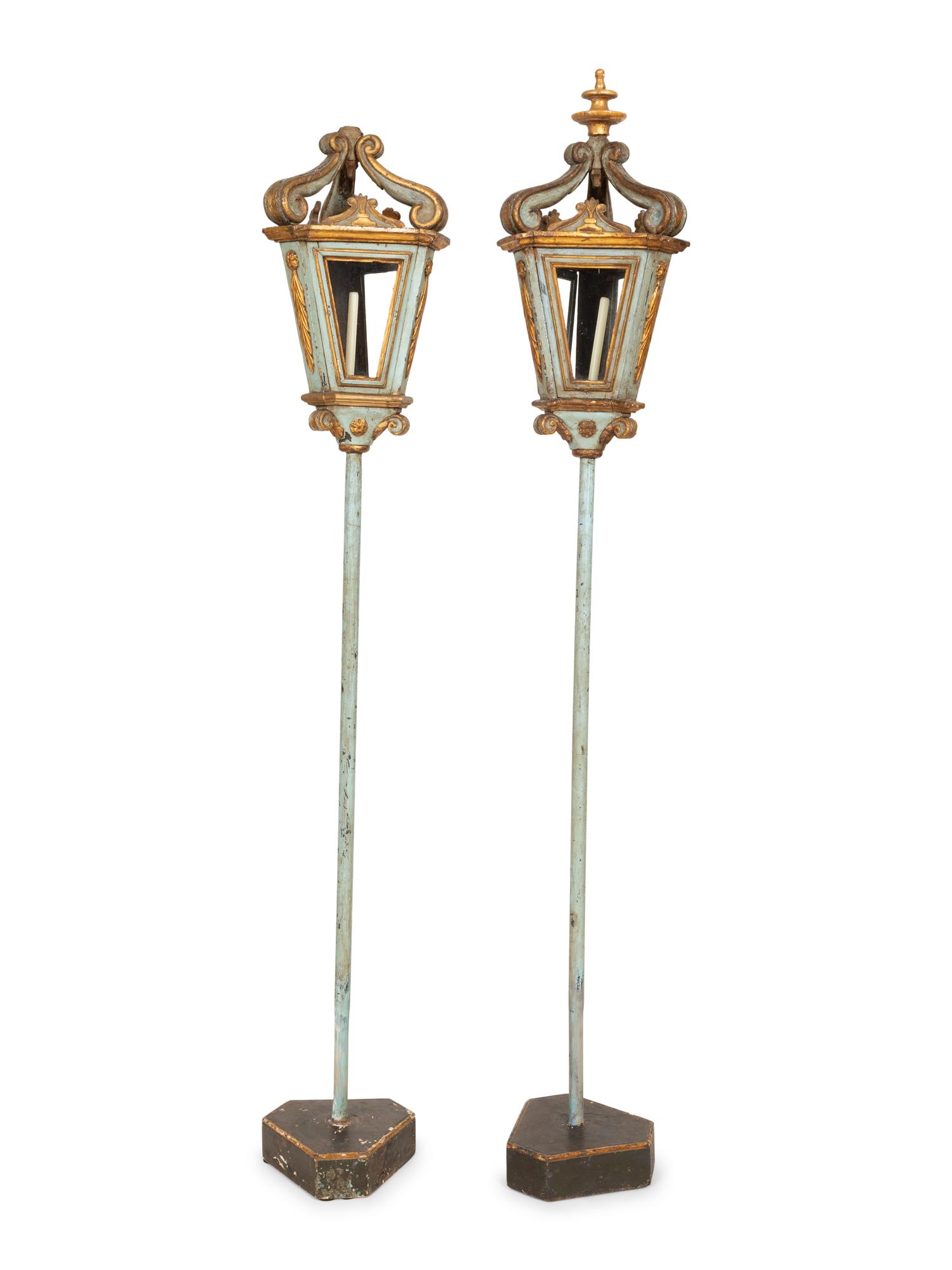 A Pair of Italian Blue Painted and Parcel Gilt Gondola Lanterns