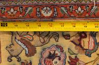 A Qom Silk and Metallic Thread Rug