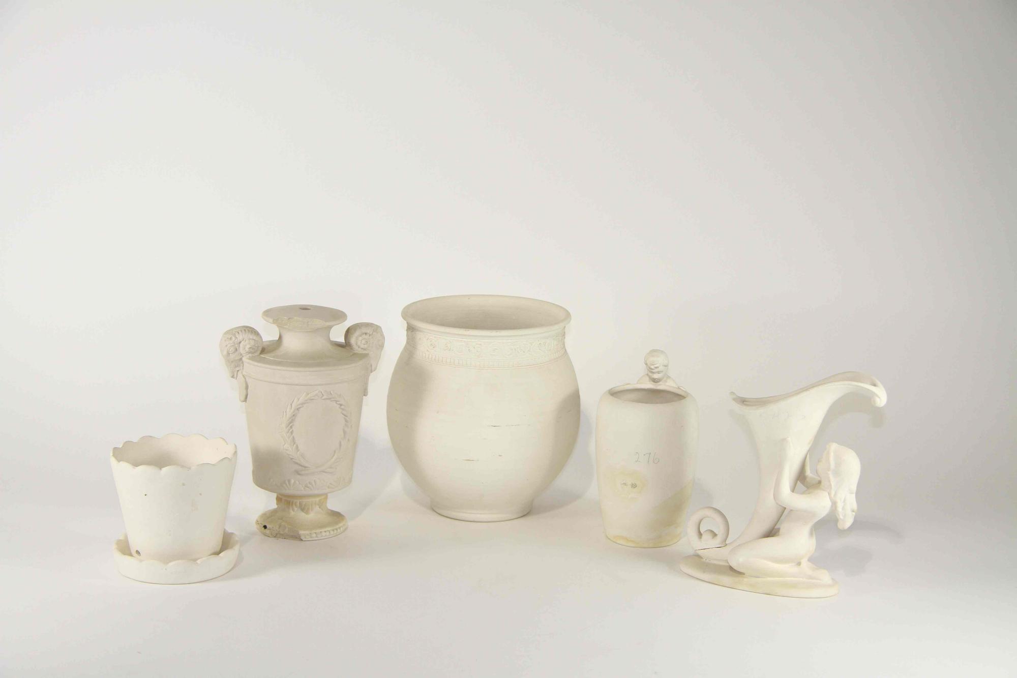 A Group of Ten Unglazed Haeger Pottery Articles Height of tallest 16 3/4 inches.