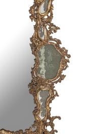 An Italian Silvered Wood and Etched Glass Mirror