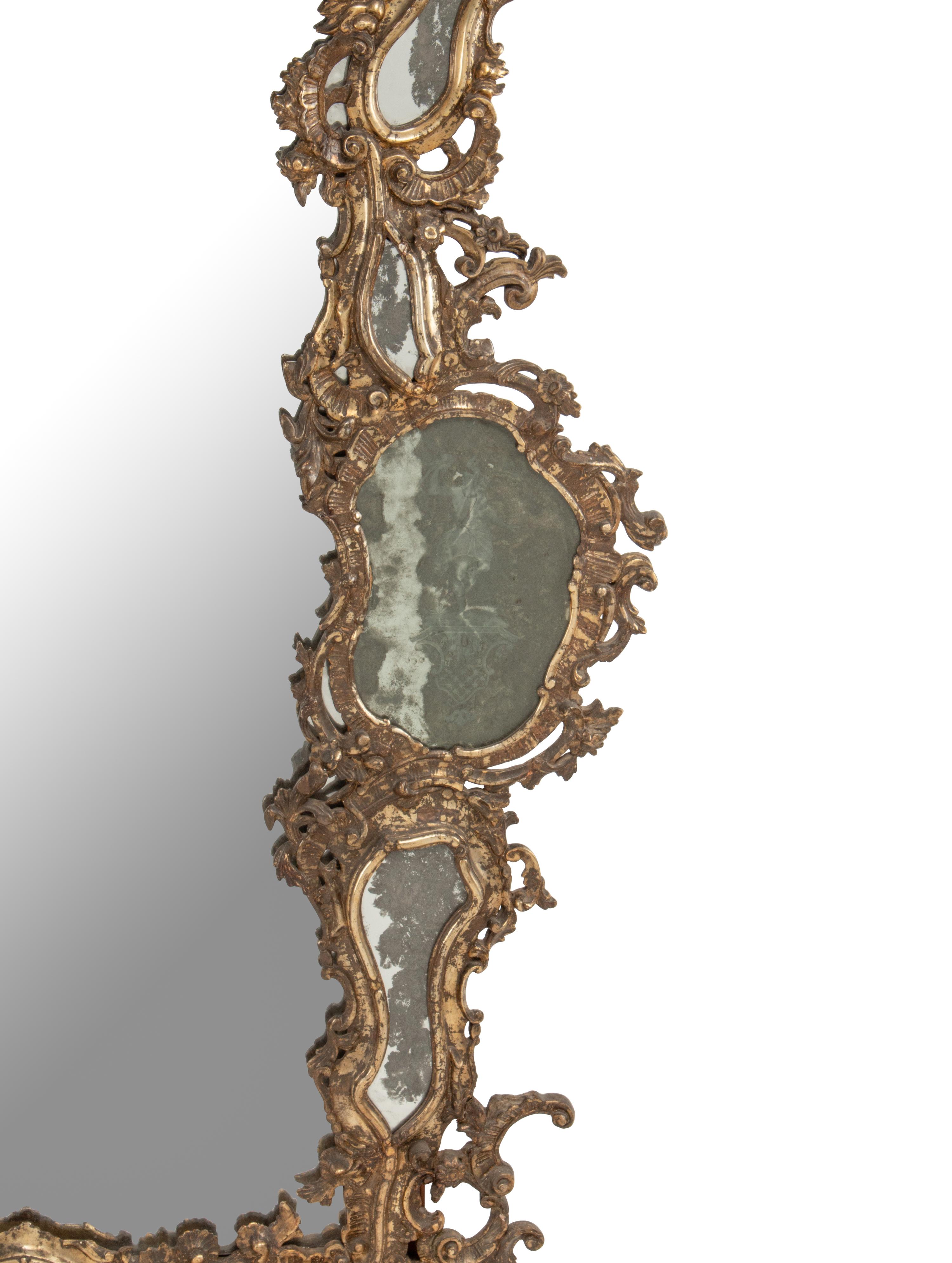 An Italian Silvered Wood and Etched Glass Mirror