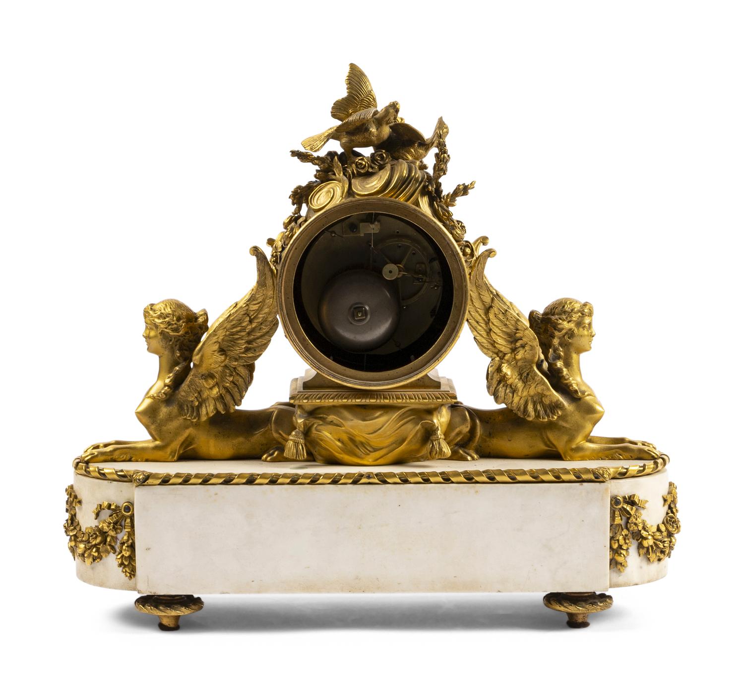 An Empire Gilt Bronze and Marble Mantel Clock
