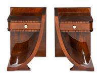 A Pair of Art Deco Style Rosewood and Mahogany Veneered Bedside Stands