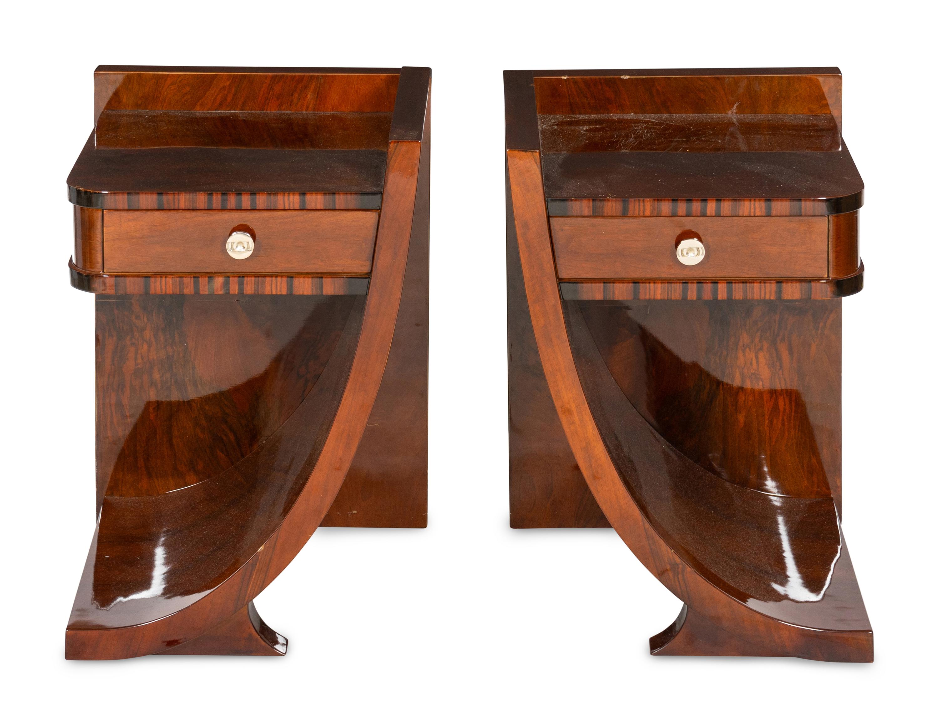A Pair of Art Deco Style Rosewood and Mahogany Veneered Bedside Stands