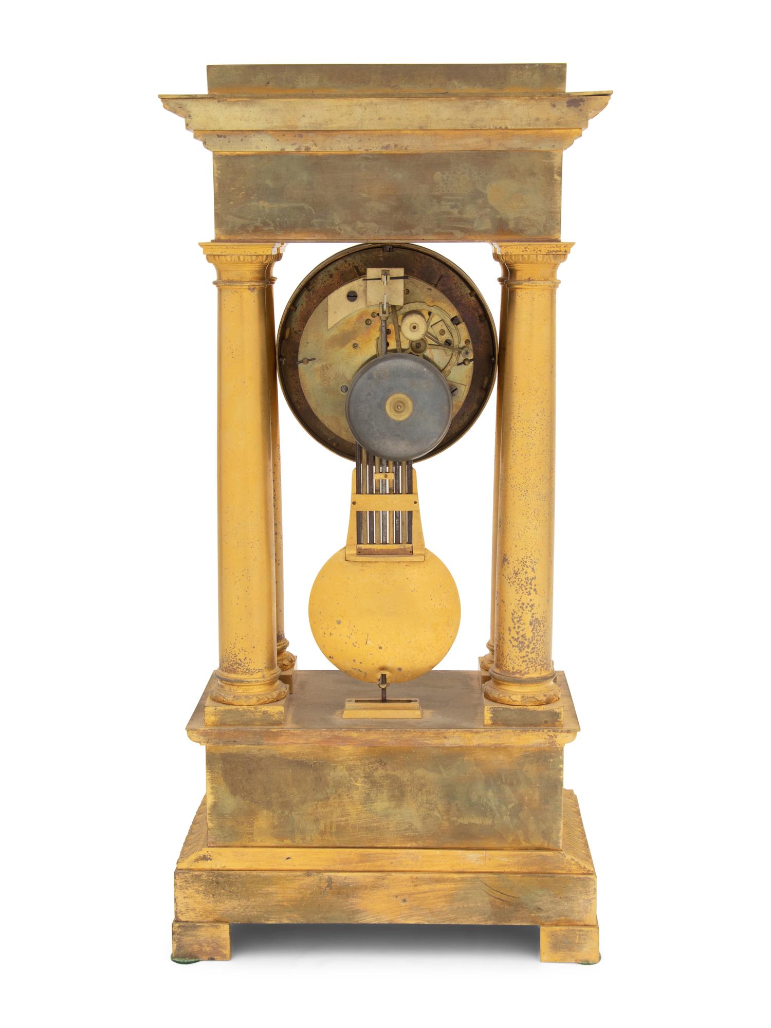 A Charles X Gilt Bronze Mantel Clock