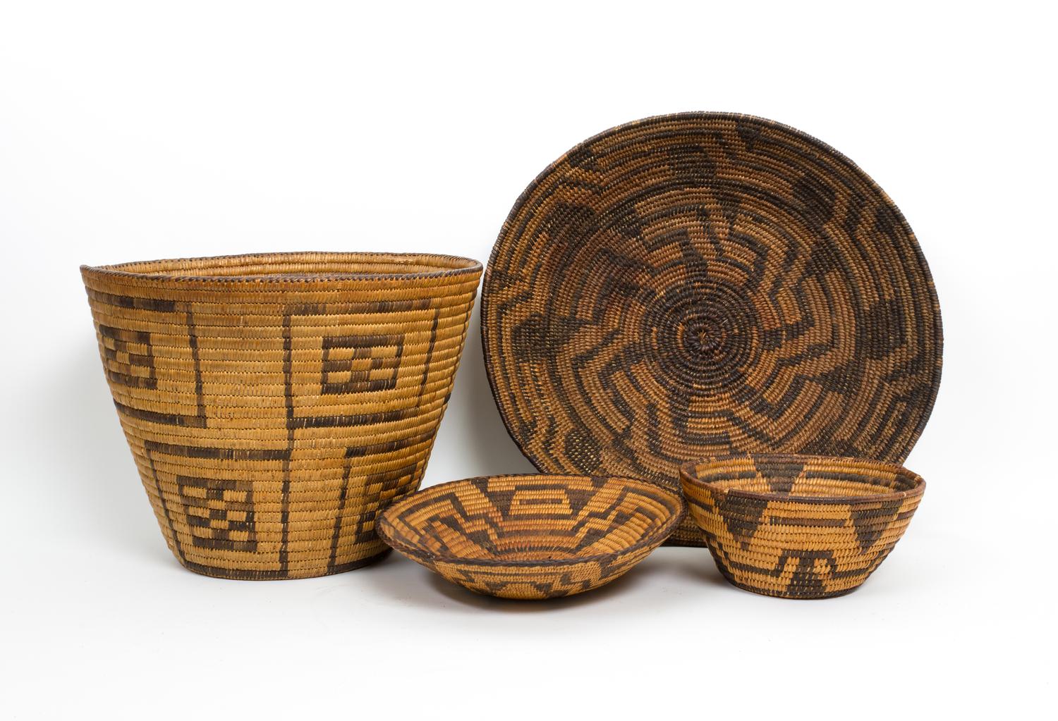 Four Pima Baskets Height of largest 9 1/2 x diameter 12 inches.