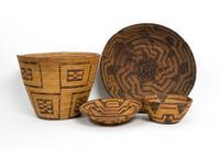 Four Pima Baskets Height of largest 9 1/2 x diameter 12 inches.