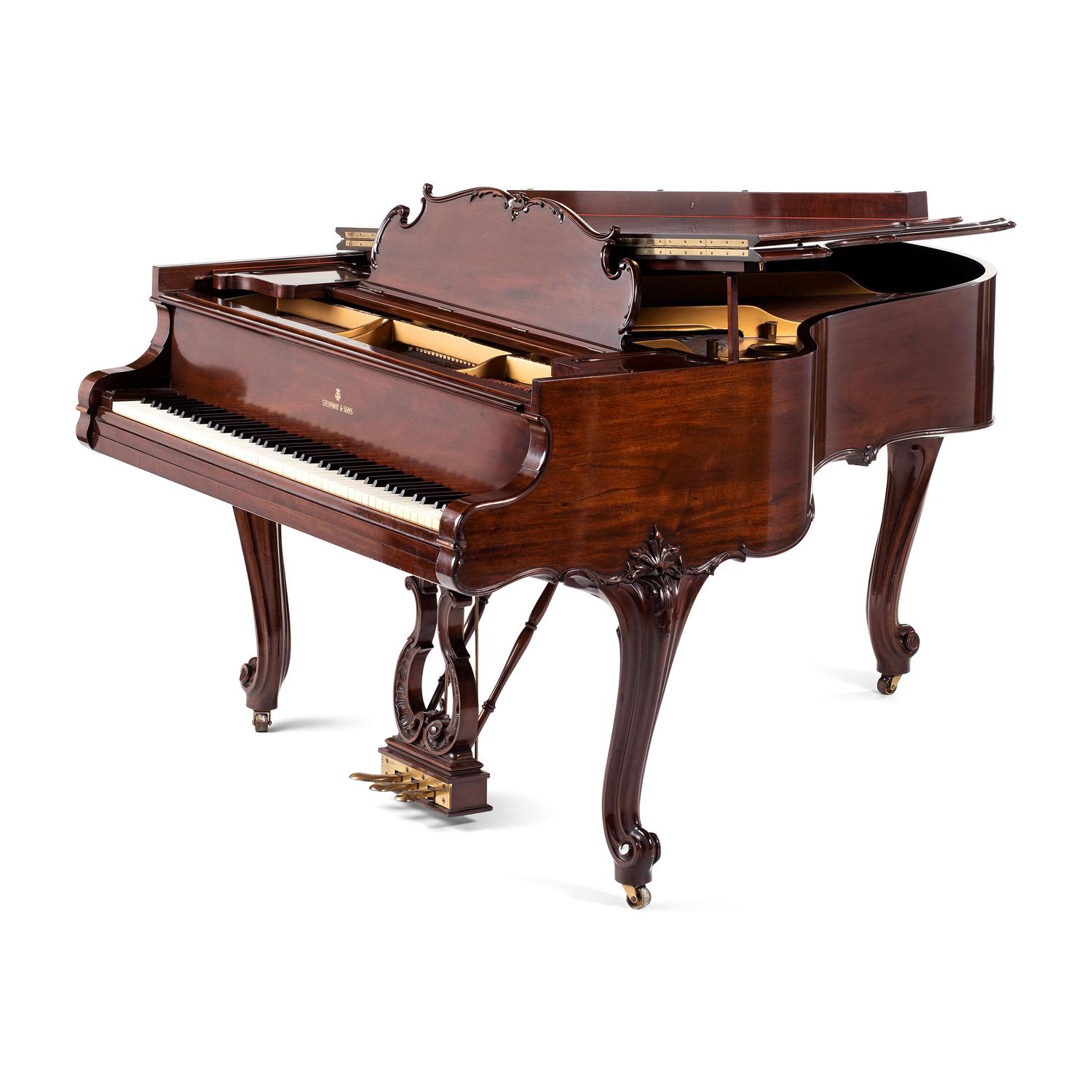 A Steinway and Sons Louis XV Style Walnut Grand Piano