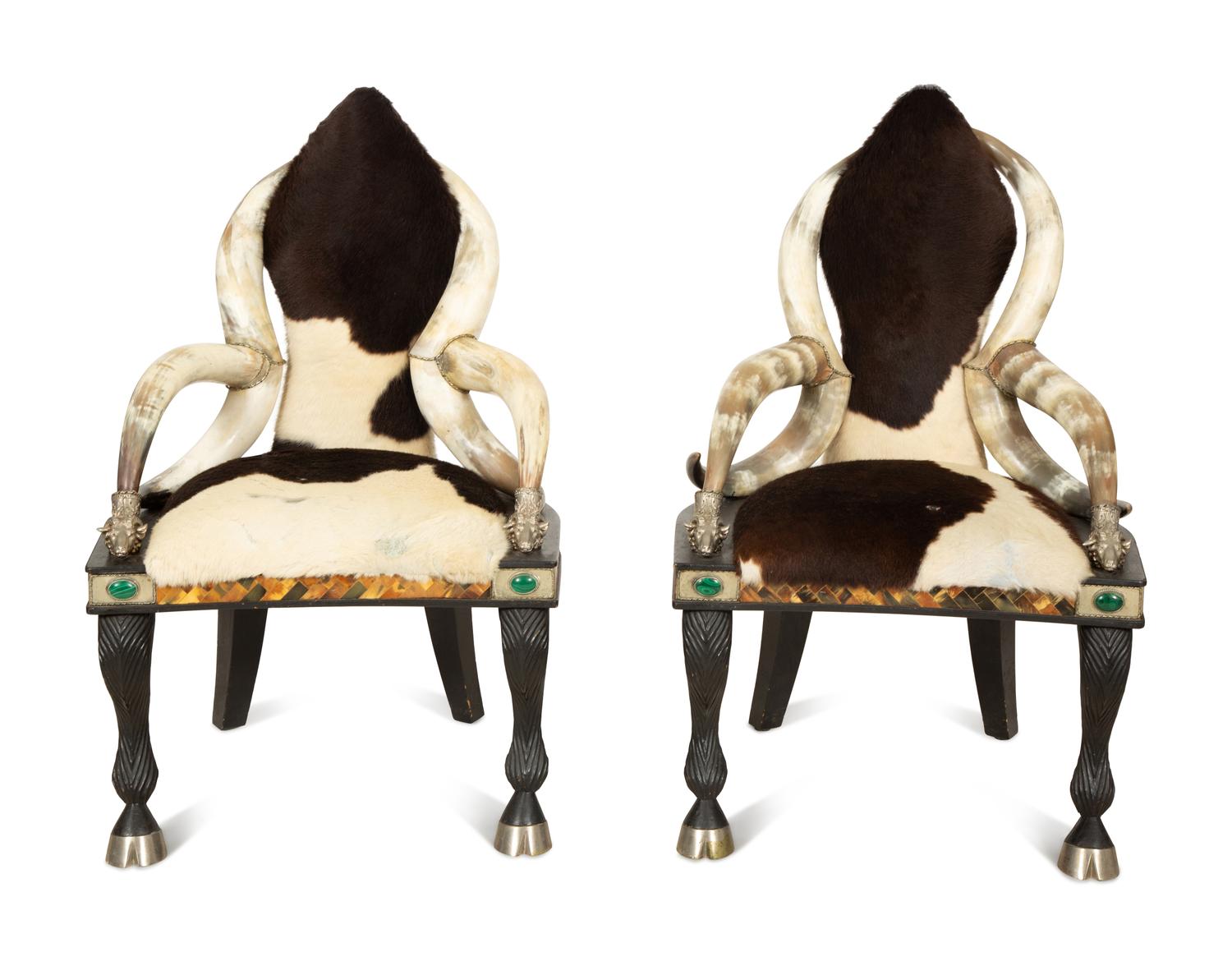 A Pair of Anthony Redmile Longhorn Chairs with Cow Hide Upholstery