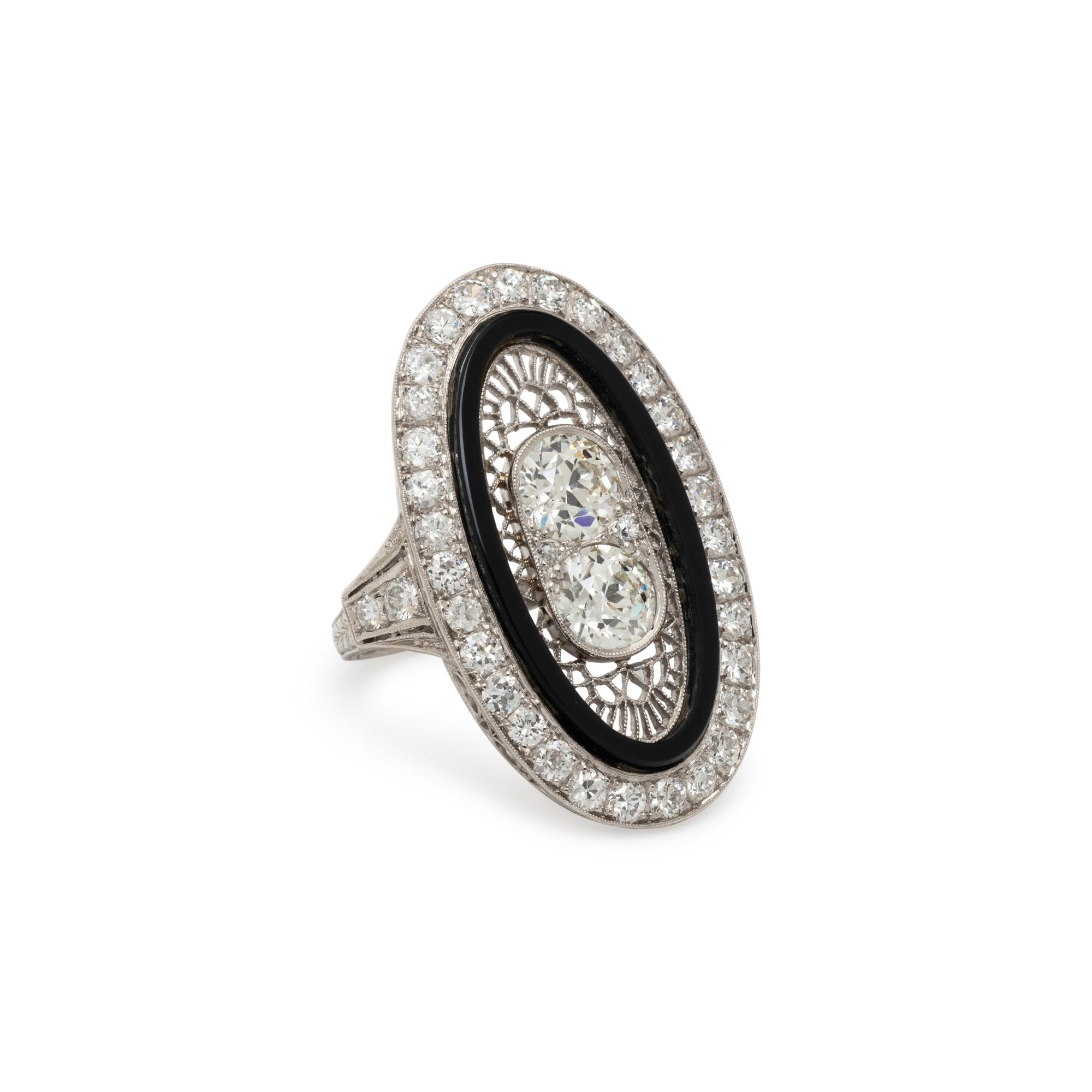 ONYX, DIAMOND, AND PLATINUM RING