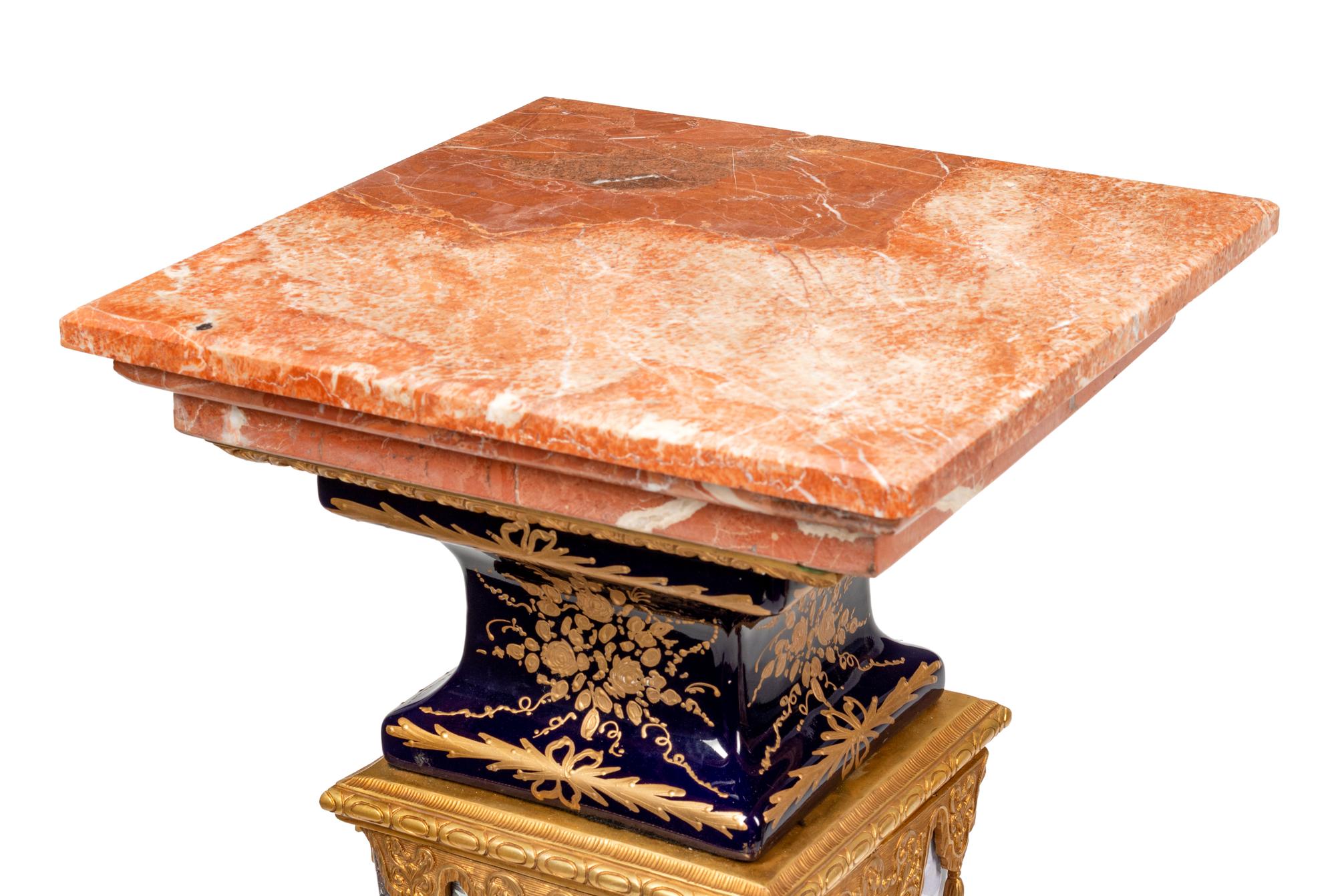 A Pair of Sèvres Style Gilt Bronze Mounted Marble and Transfer-Printed Porcelain Pedestals