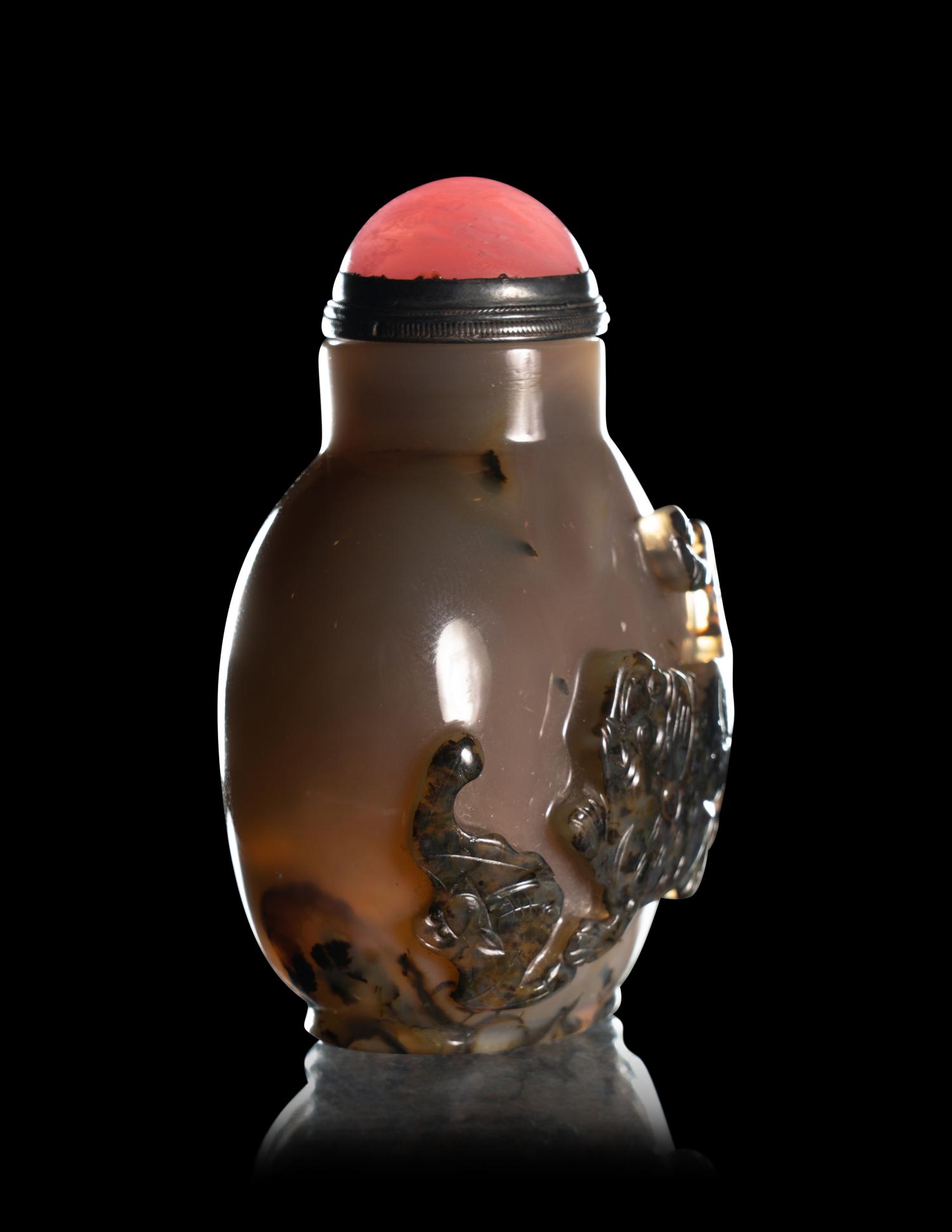 Two Carved Agate 'Fu Lion' Snuff Bottles