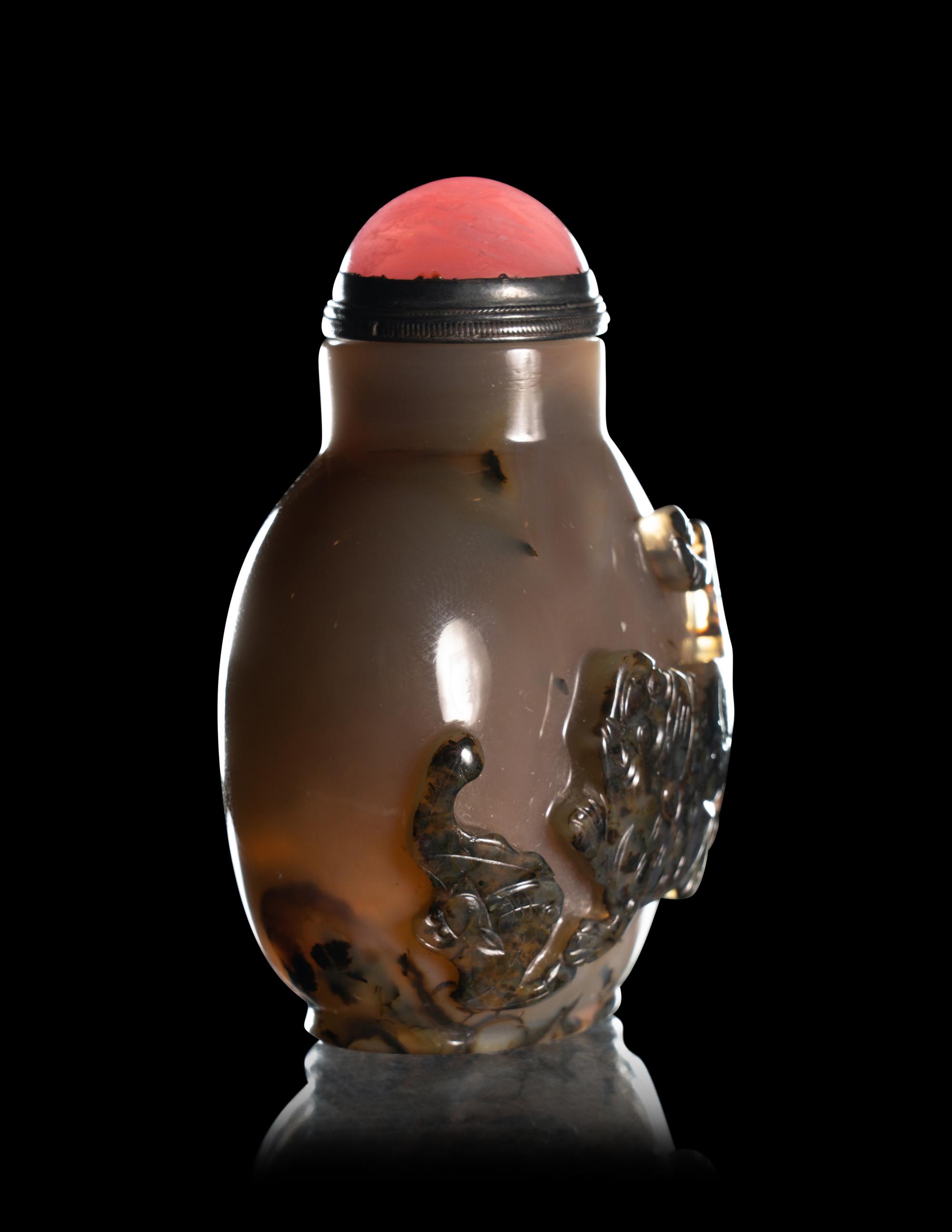 Two Carved Agate 'Fu Lion' Snuff Bottles