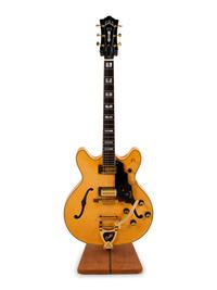 A Guild Tiger Maple and Mother-of-Pearl Inlaid Electric Blues Guitar