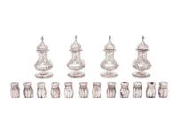 A Group of Sixteen Silver Casters