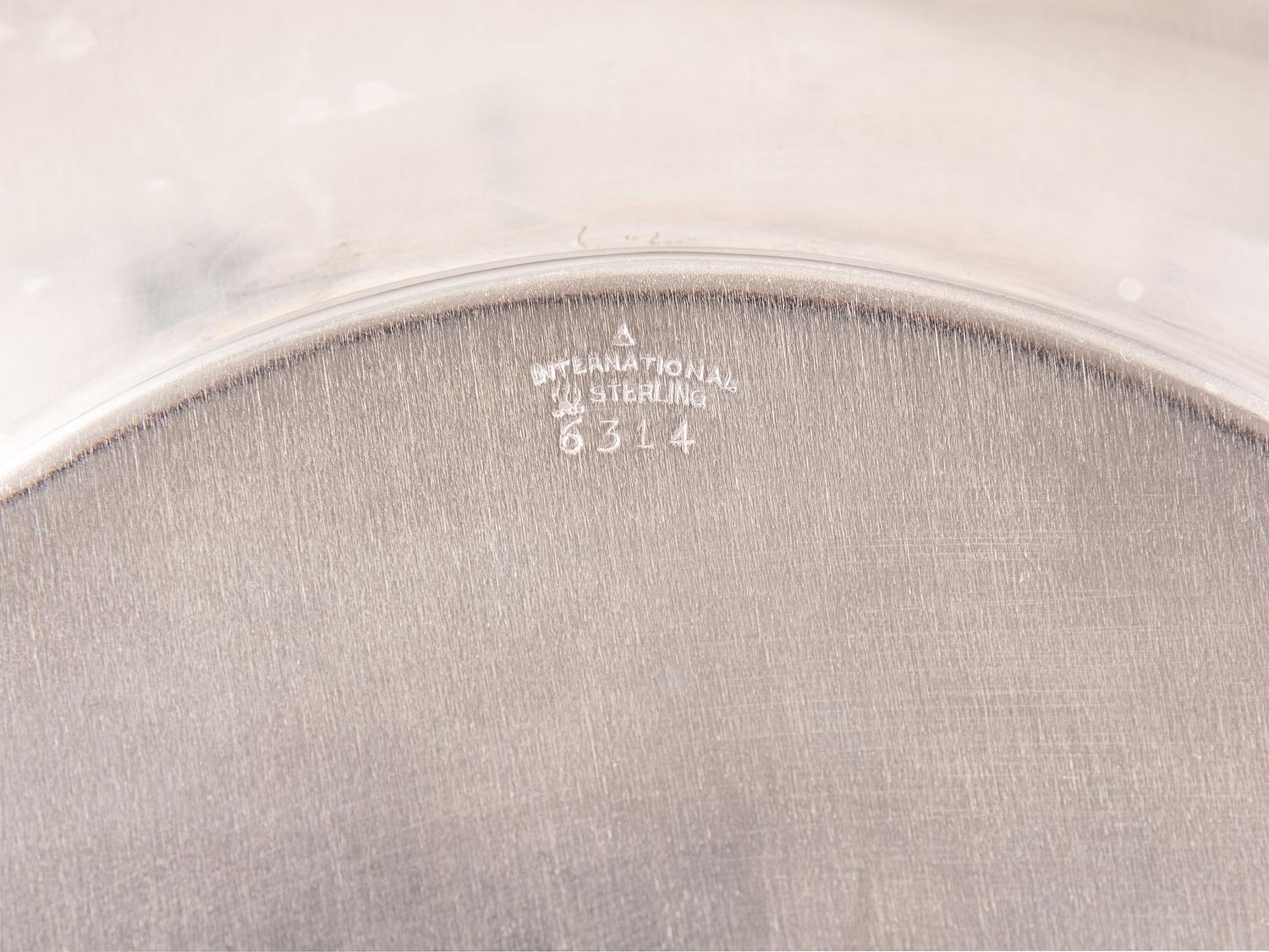 A Set of Twelve American Silver Bread Plates
