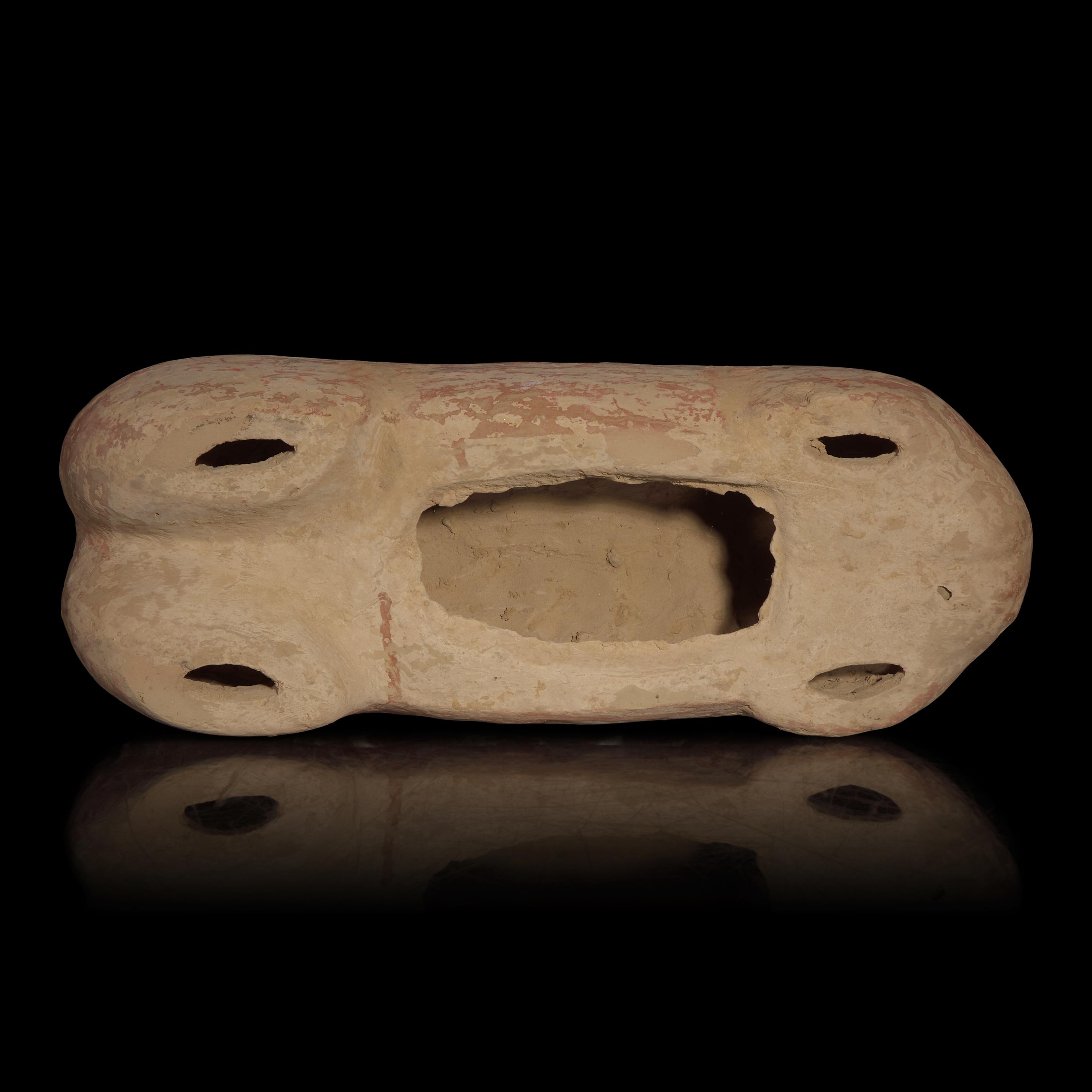 A Chinese Pottery Figure of a Recumbent Horse, Han Dynasty — 漢 彩繪灰陶馬