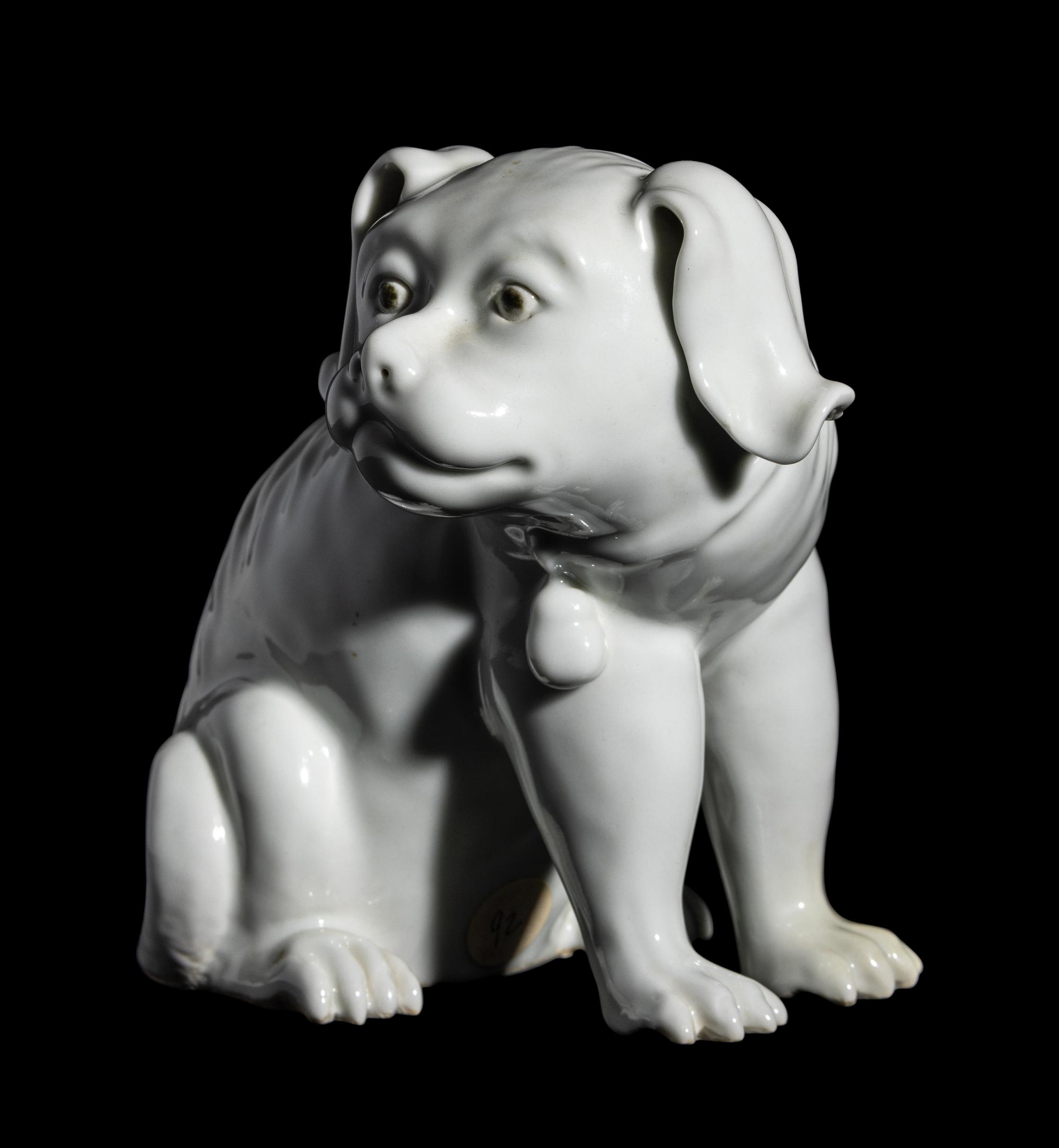 A Japanese Hirado White Glazed Porcelain Figure of a Puppy