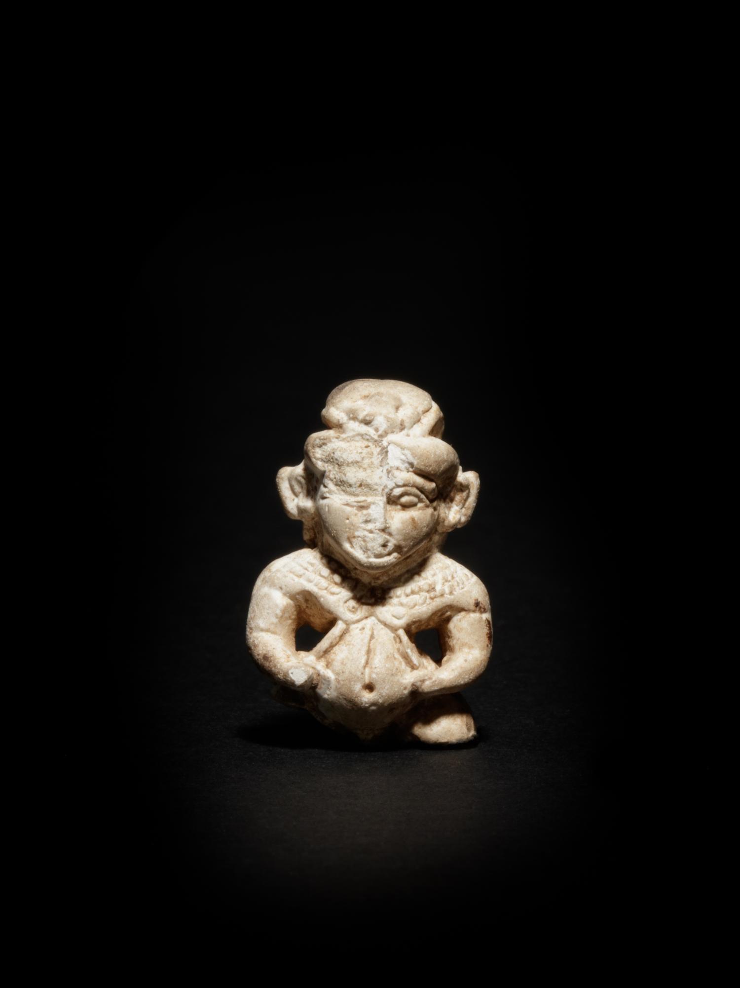 An Egyptian Glazed Steatite Amulet of Bes and Pataikos