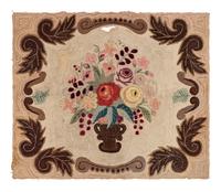 A Cotton Floral Urn and Brown Acanthus Leaf Decorated Hooked Rug