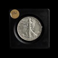A Collection of Twenty-Six Walking Liberty 50c Coins