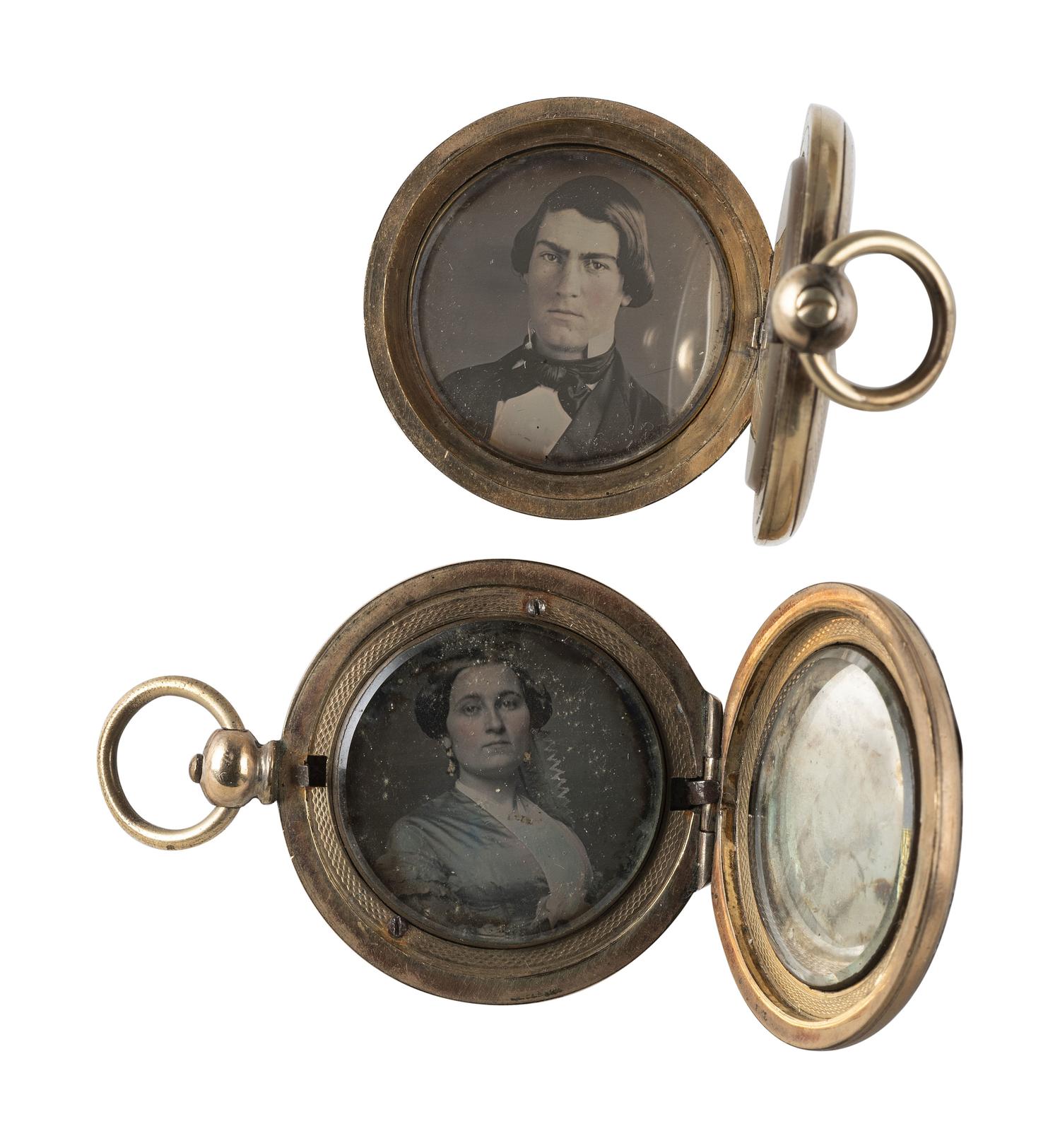 [EARLY PHOTOGRAPHY]. 11 lockets containing daguerreotypes and tintypes.