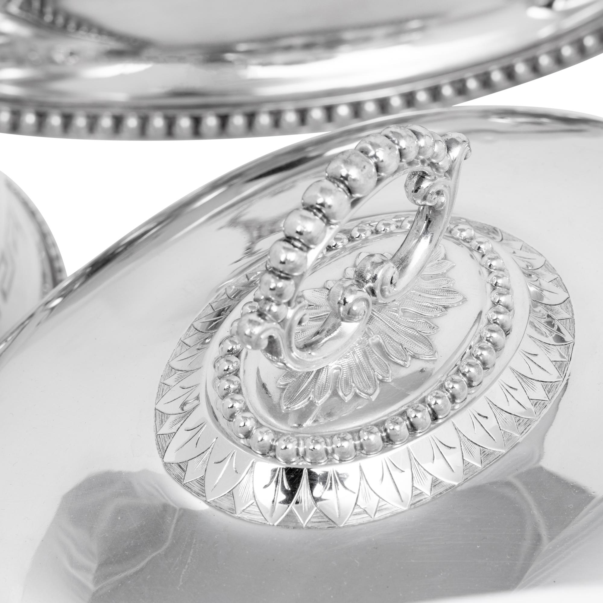 A Set of Four English Silver-Plate Cloches