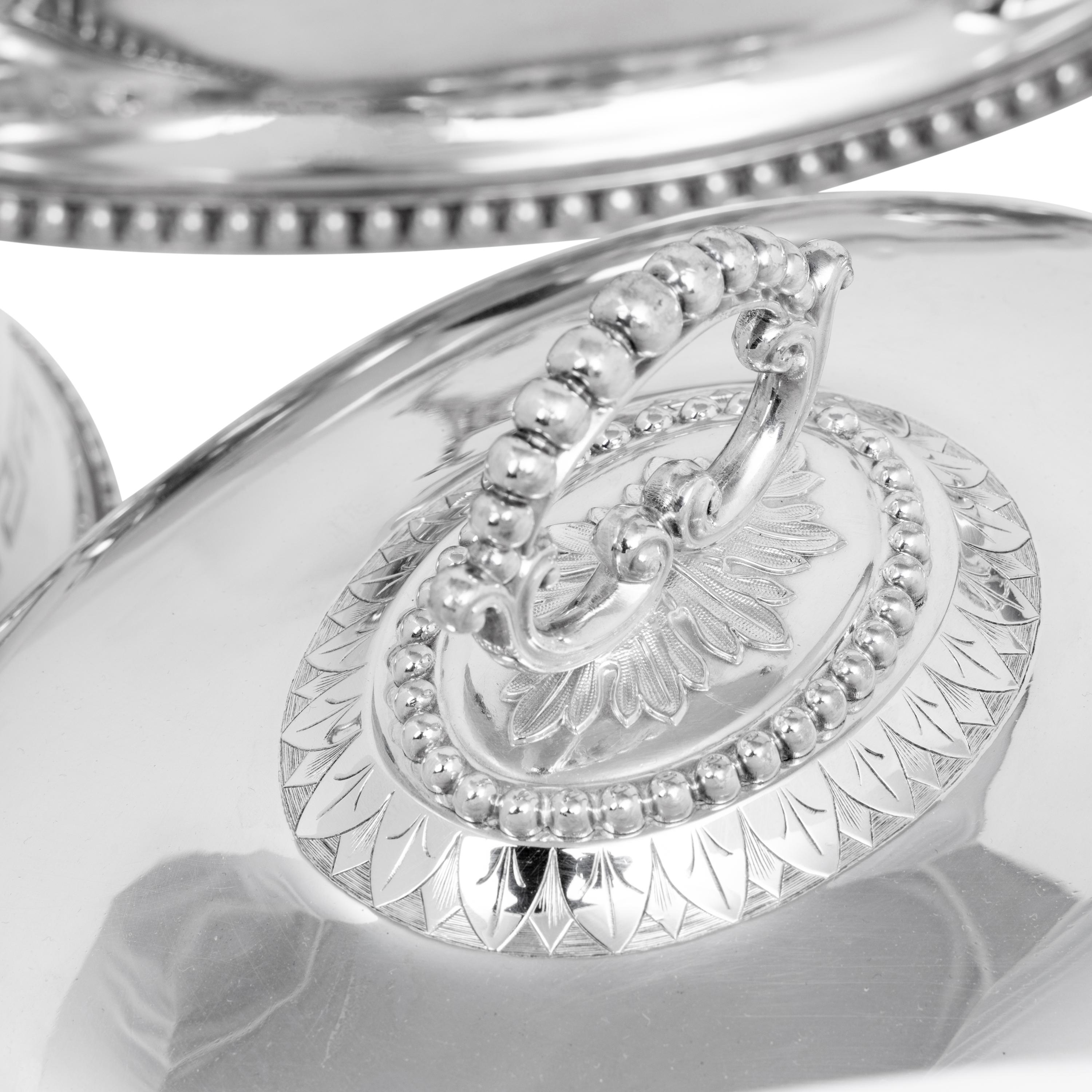 A Set of Four English Silver-Plate Cloches