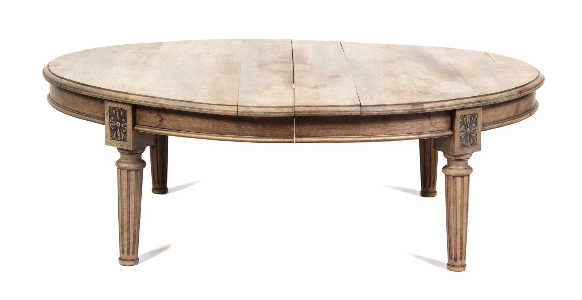 A Louis XVI Style Low Table Height 18 x diameter 51 inches.