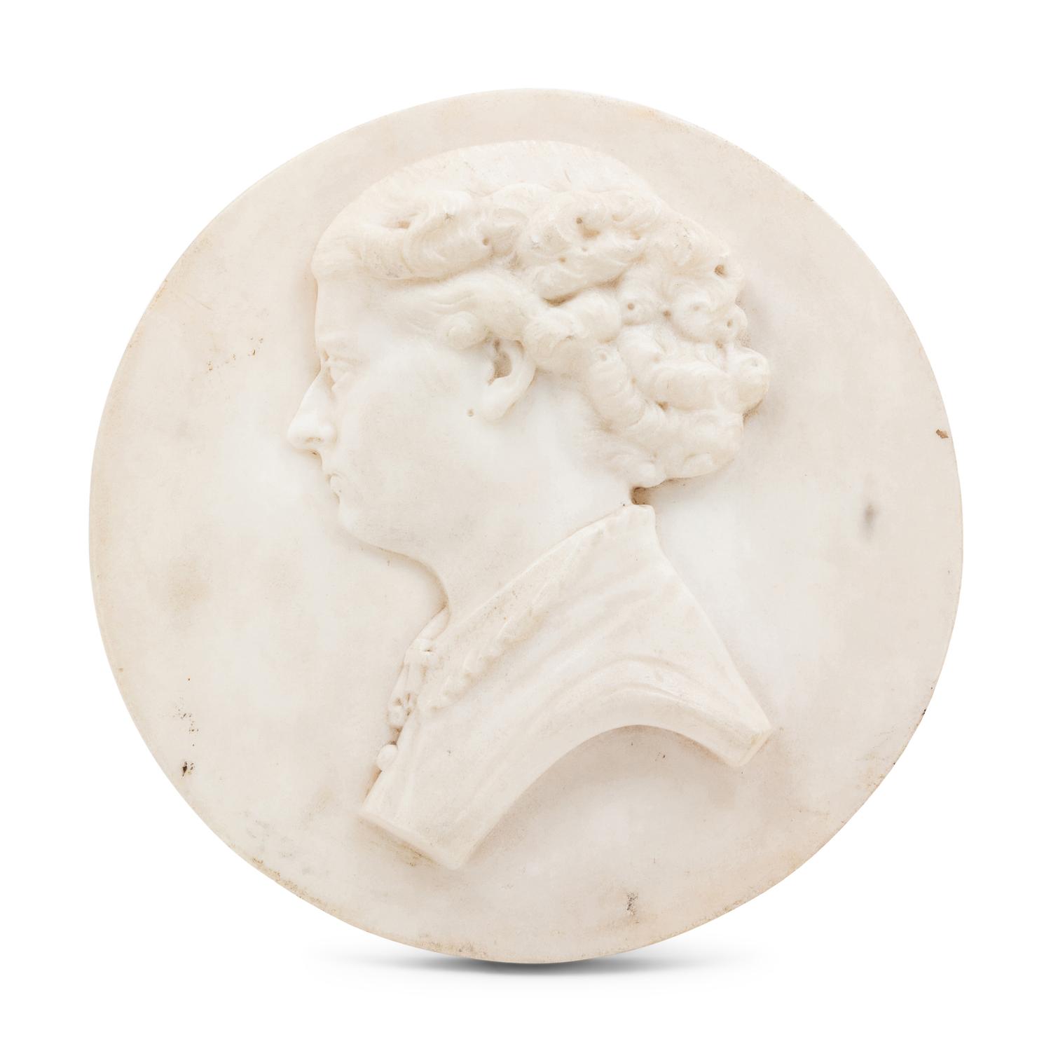 A Continental Carved Marble Profile Medallion