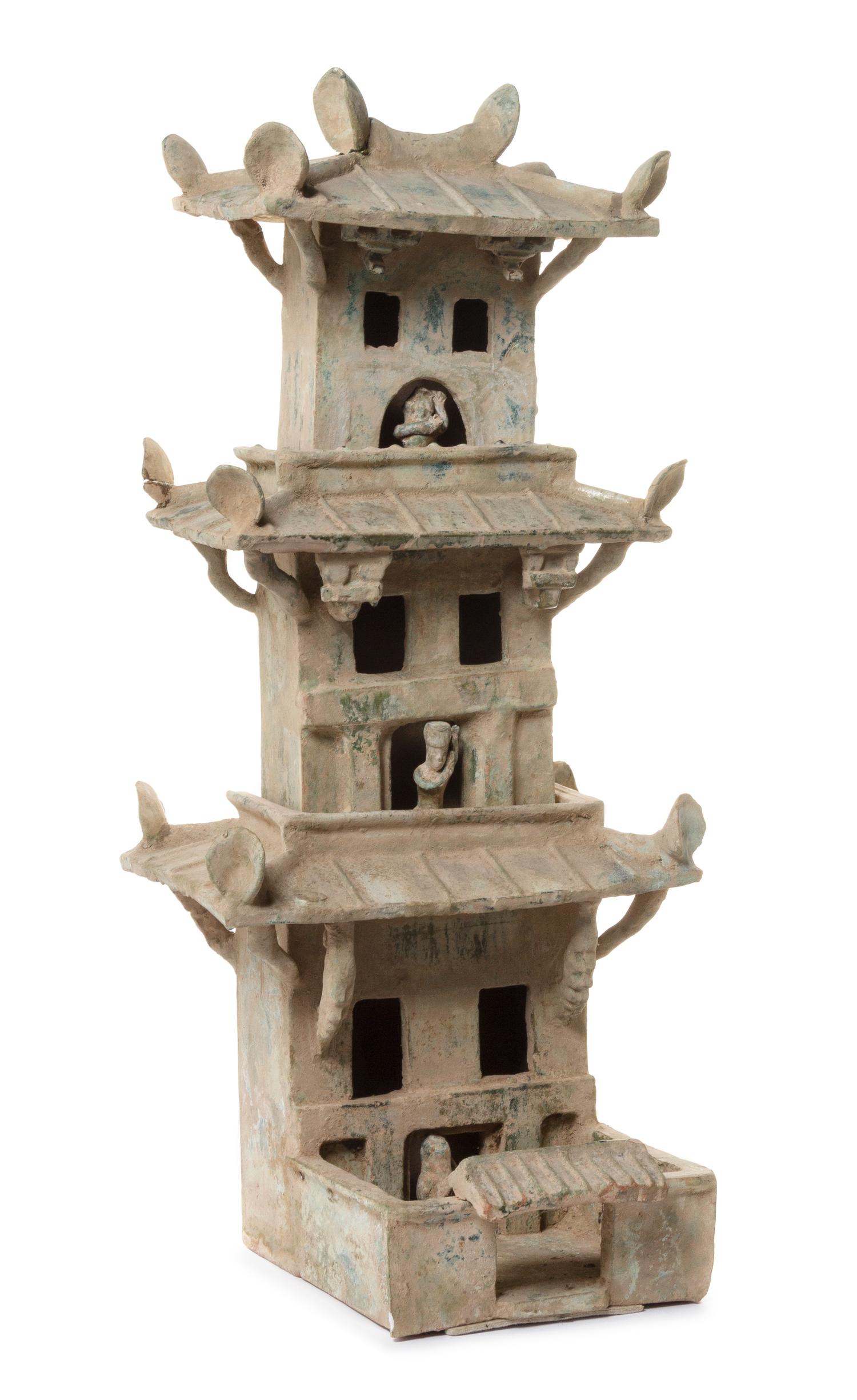 A Green Glazed Pottery Model of a Three-Section Watch Tower — HAN DYNASTY