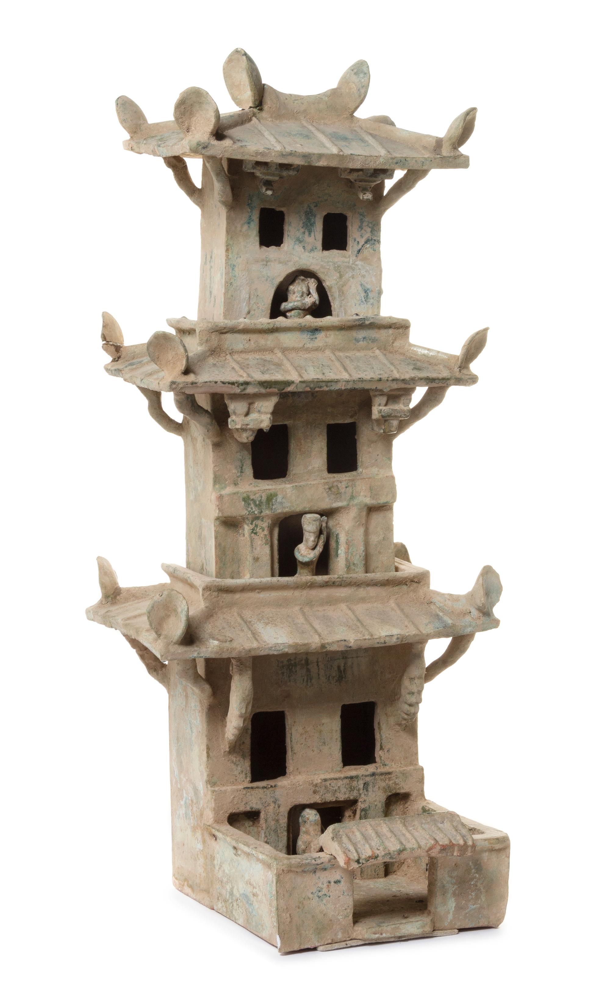 A Green Glazed Pottery Model of a Three-Section Watch Tower — HAN DYNASTY