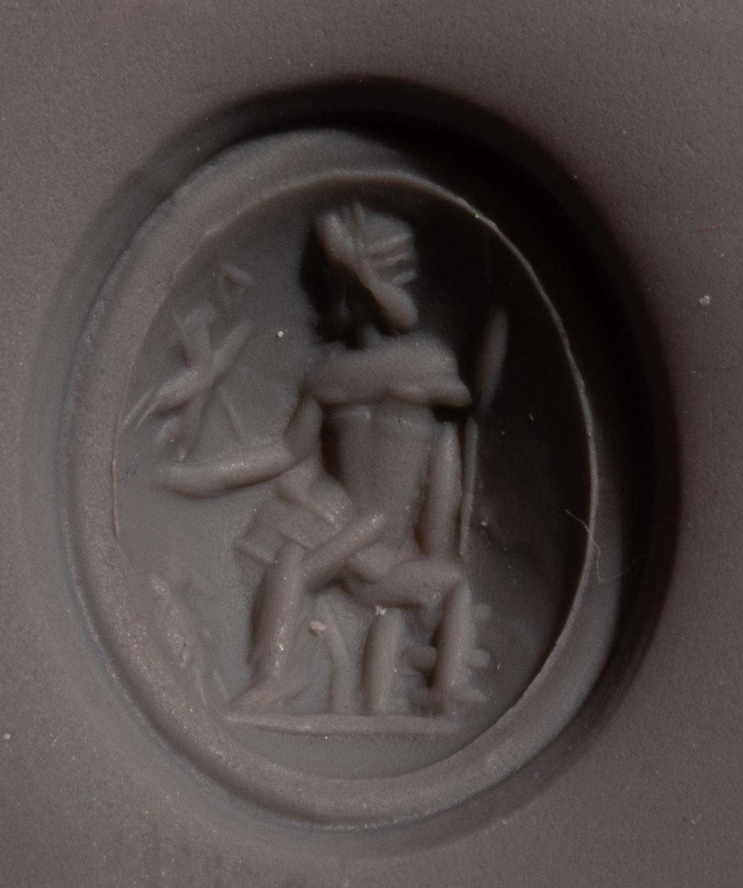 A Roman Chalcedony Ring Stone with the Gods Jupiter and Nike Enthroned — Set in a gold ring