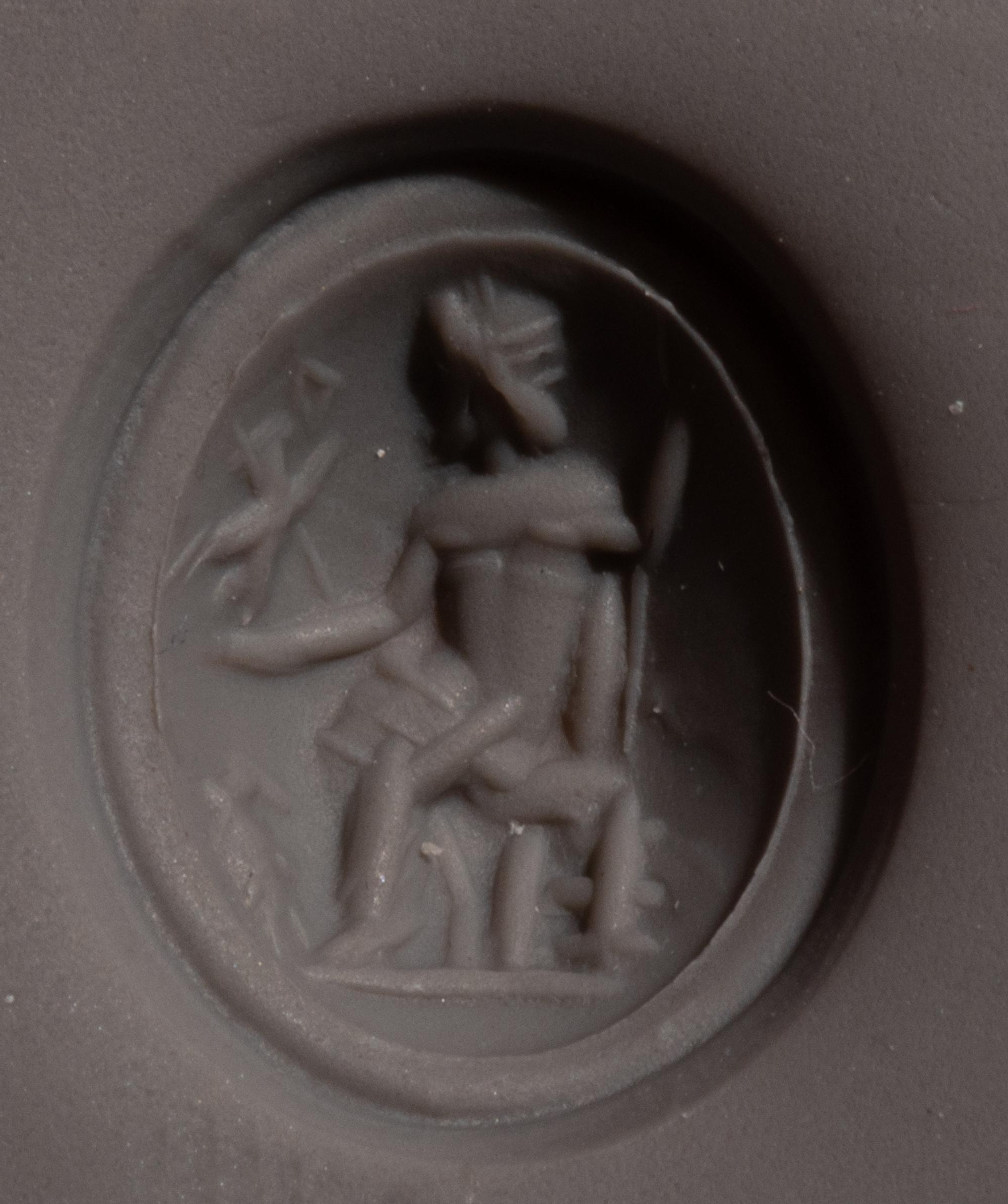 A Roman Chalcedony Ring Stone with the Gods Jupiter and Nike Enthroned — Set in a gold ring