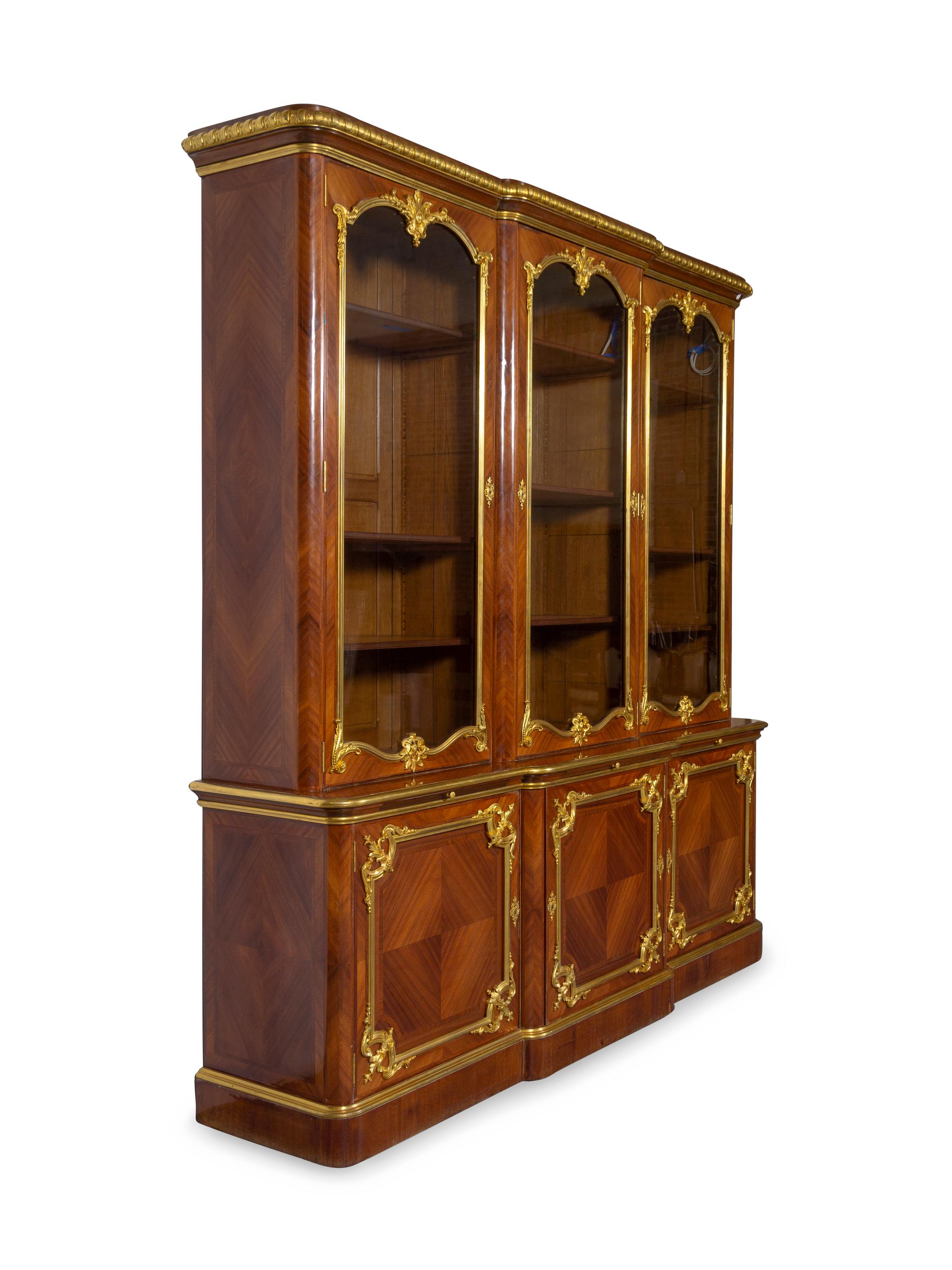 A Louis XV Style Gilt Bronze Mounted Kingwood Breakfront Cabinet
