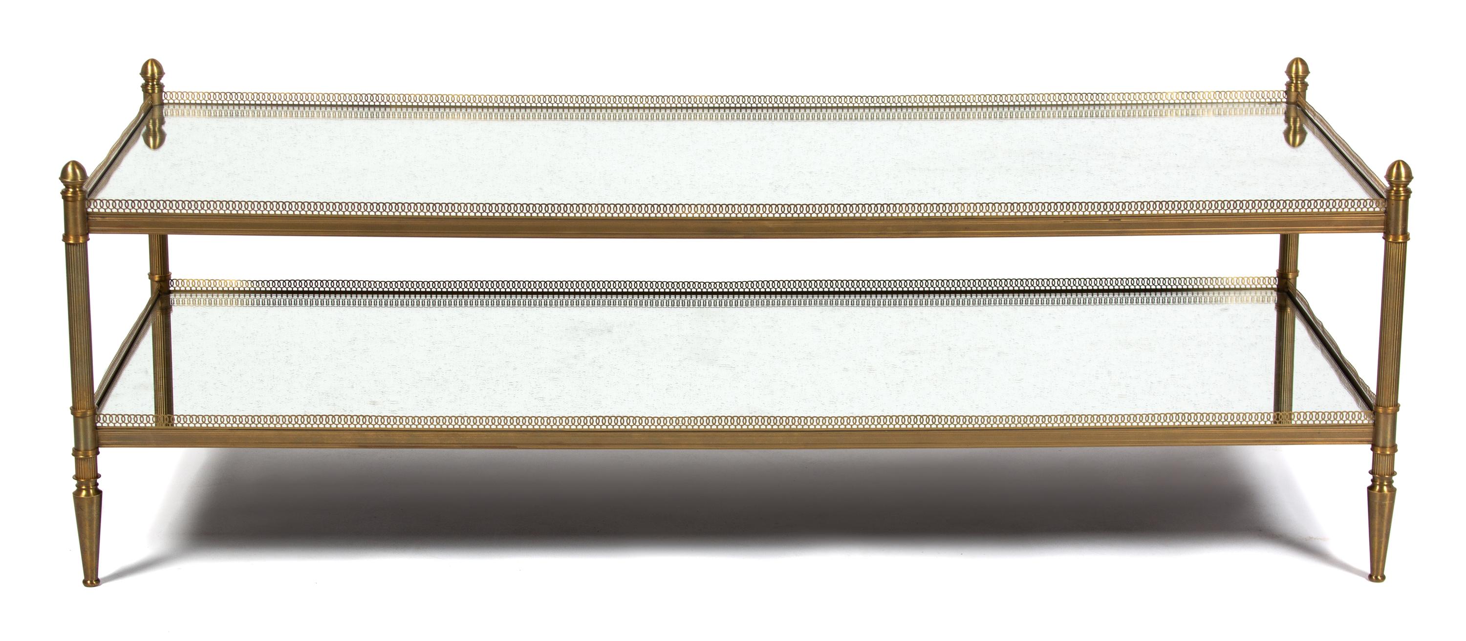 A Brass and Mirrored Glass Coffee Table Height 18 x width 60 x depth 24 inches. — 20TH CENTURY