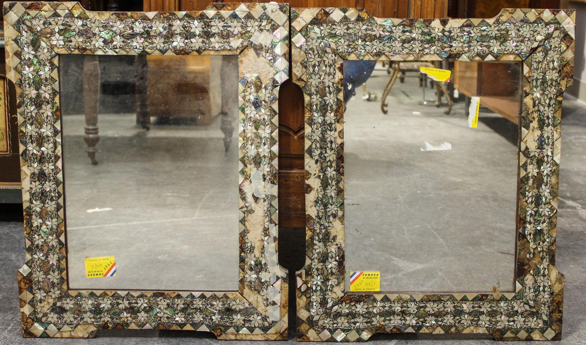 A Pair of Abalone Inlaid Mirrors. Height 22 5/8 x width 18 1/2 inches.