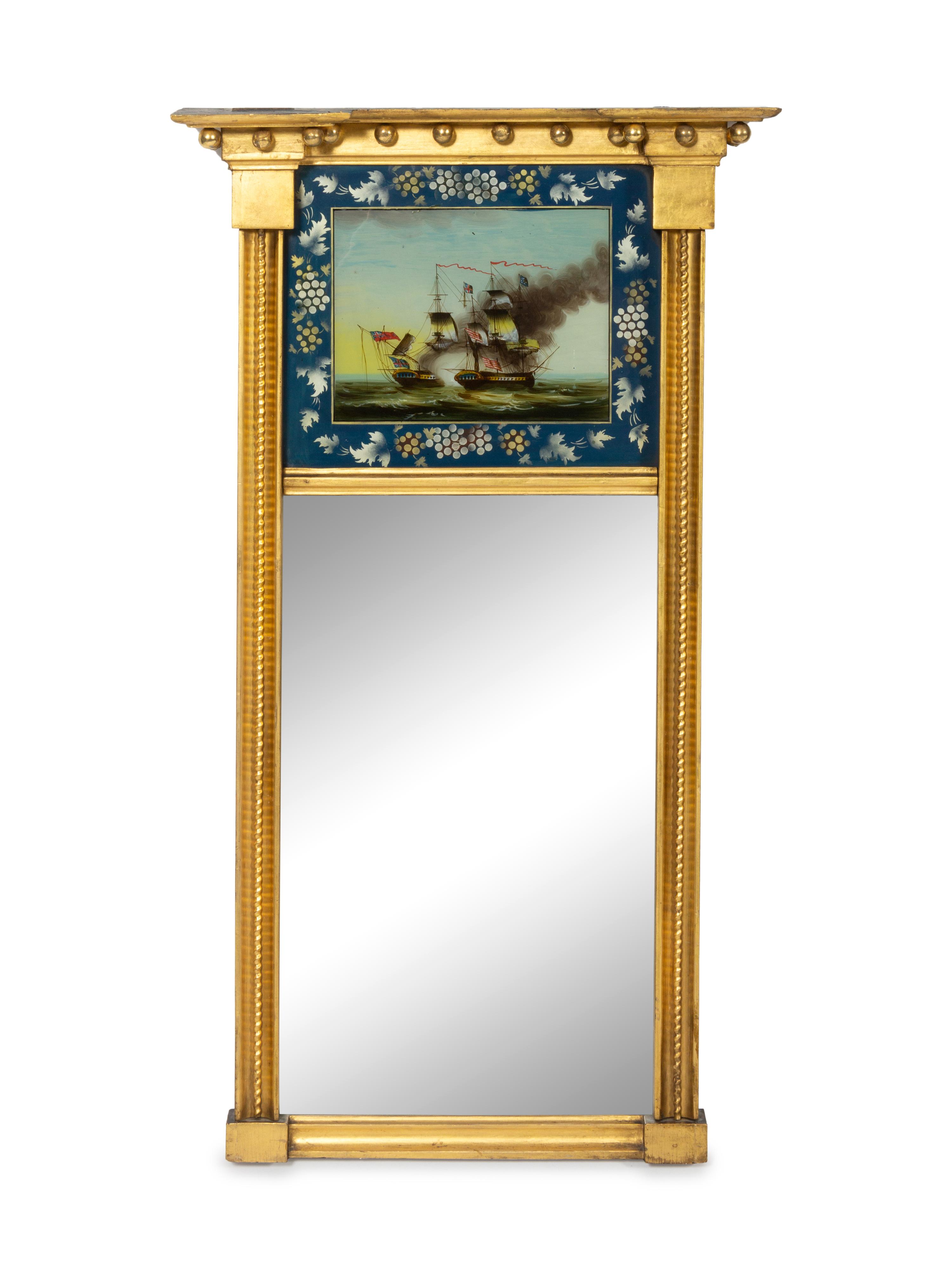 A Federal Giltwood and Eglomise Looking Glass