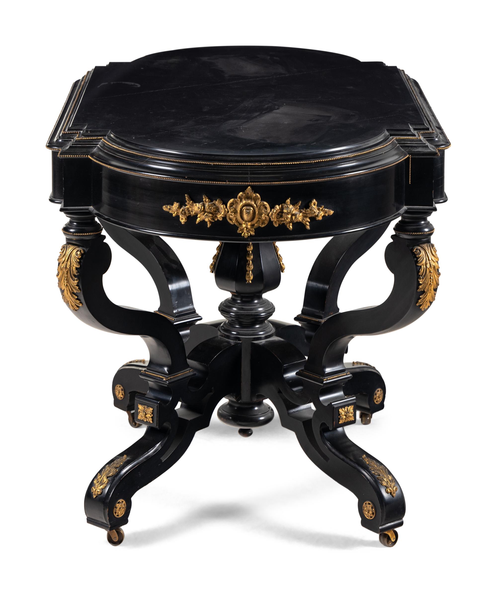 A Victorian Gilt Bronze Mounted Ebonized Center Table