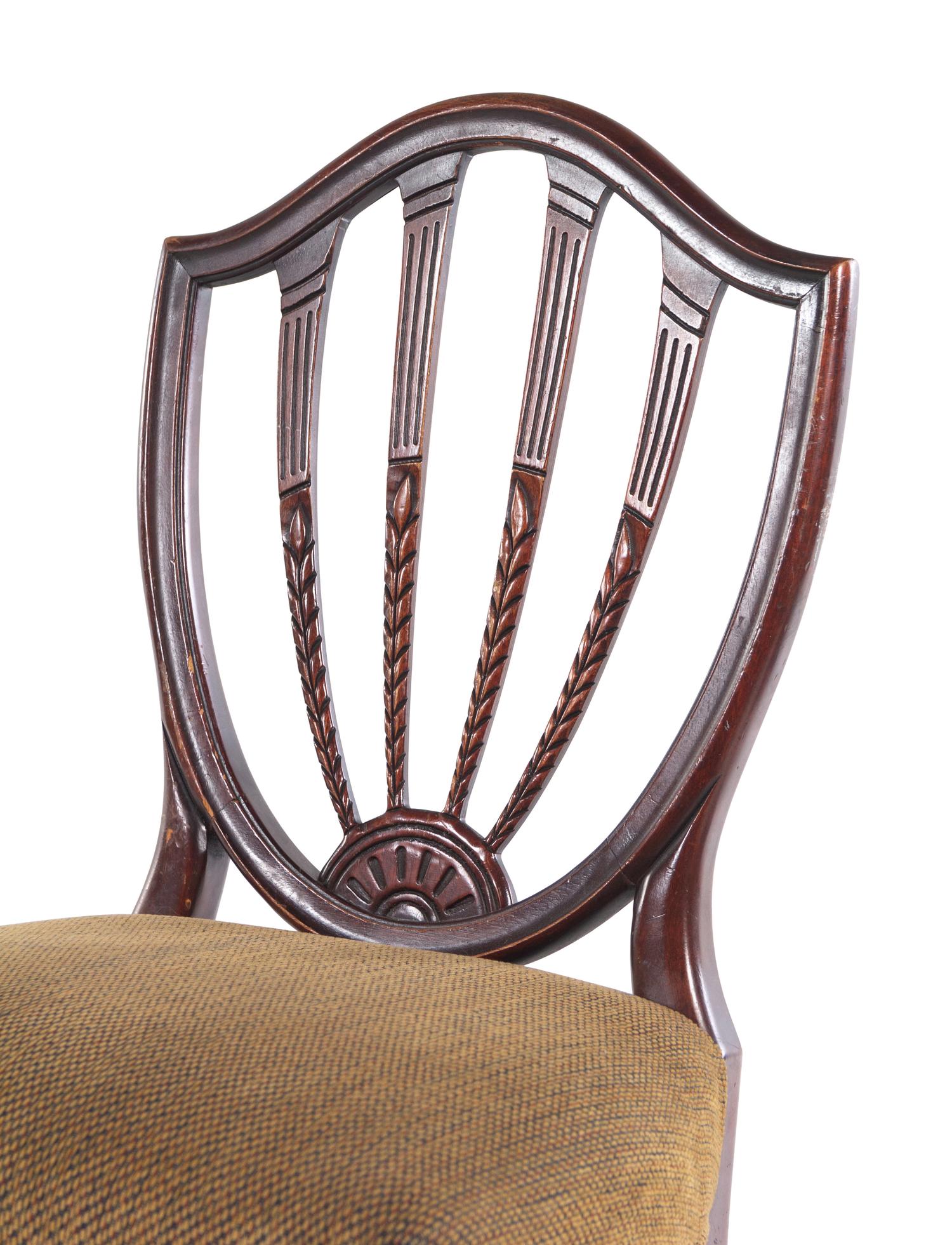 A Set of Nine George III Mahogany Dining Chairs