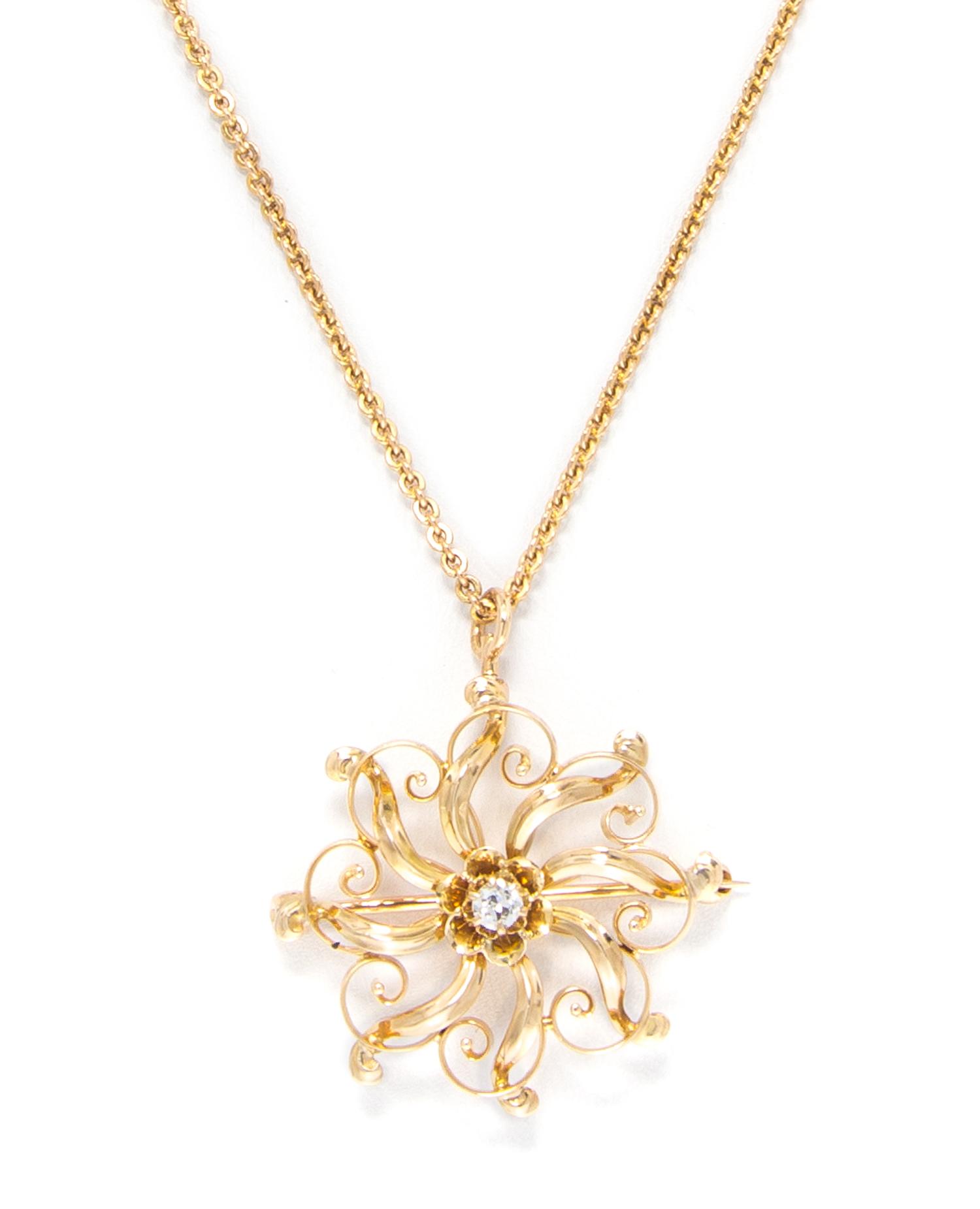 A 14 Karat Yellow Gold and Diamond Pendant/Brooch Necklace, 6.00 dwts.