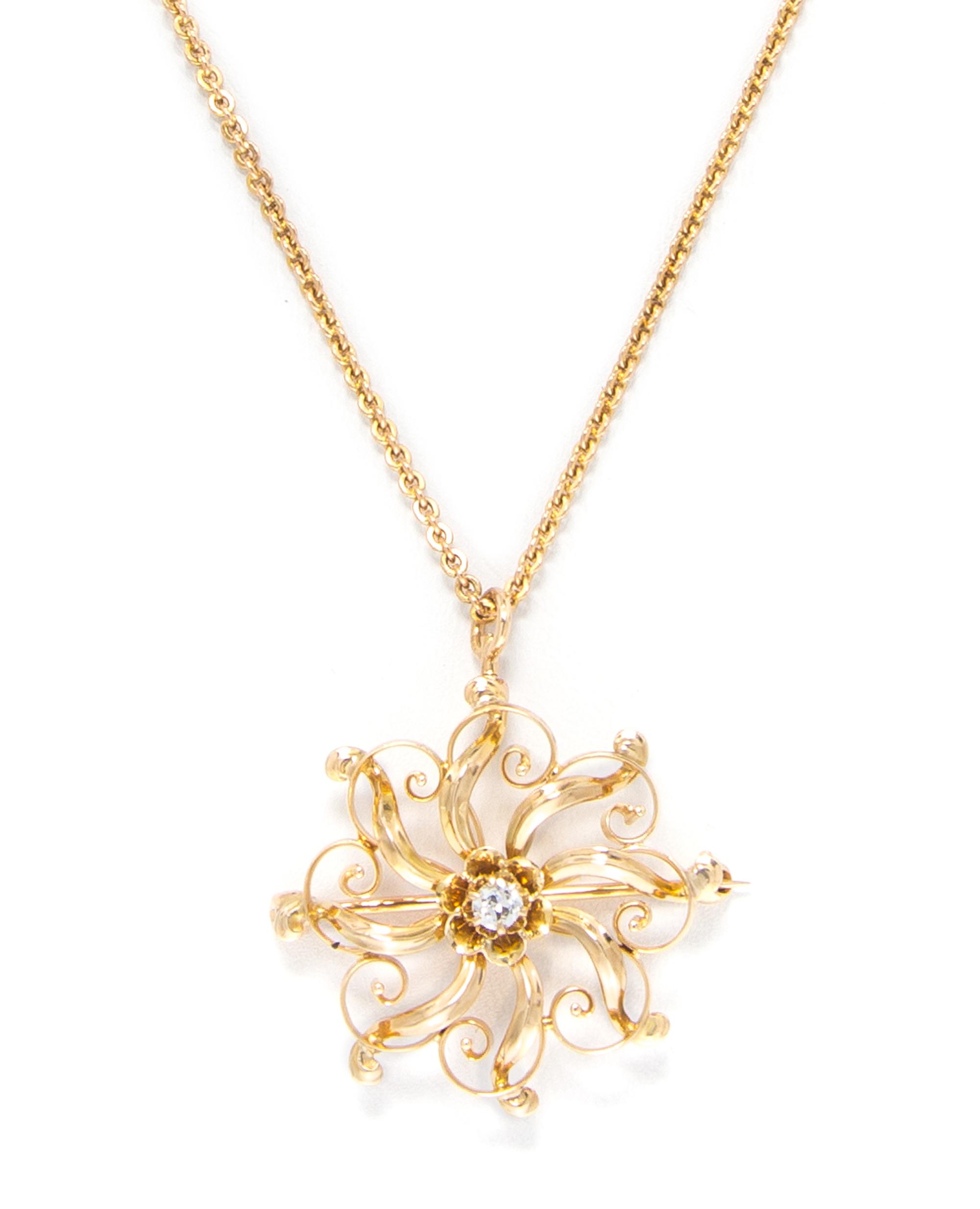 A 14 Karat Yellow Gold and Diamond Pendant/Brooch Necklace, 6.00 dwts.