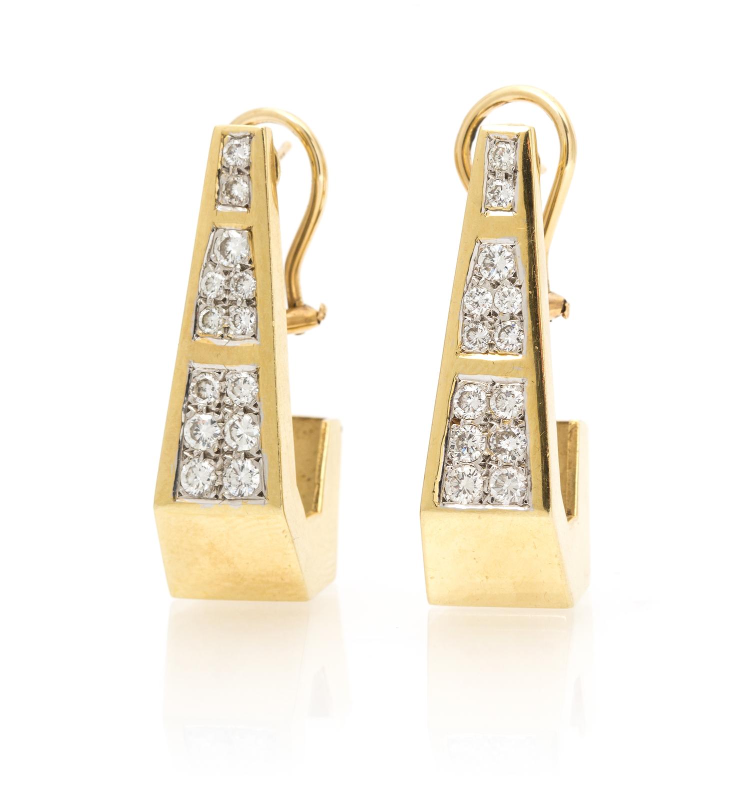 A Pair of 14 Karat Yellow Gold and Diamond Earclips, 13.50 dwts.