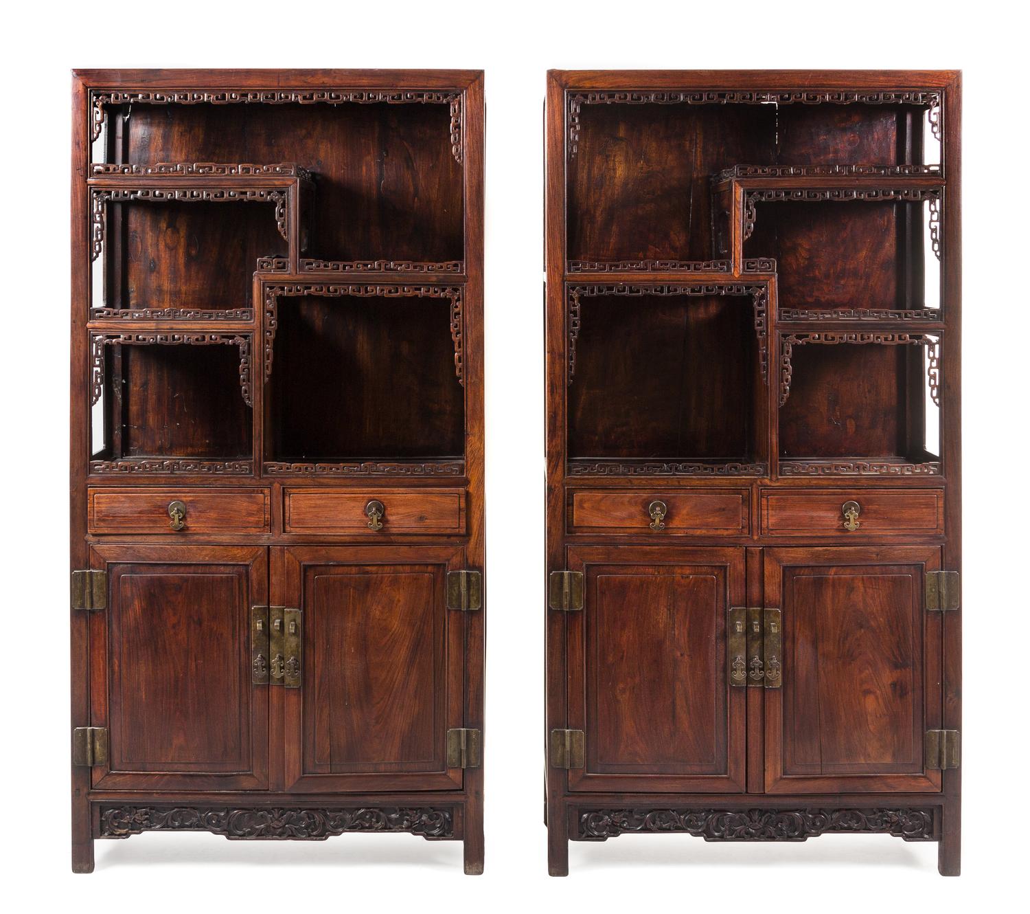 A Pair of Chinese Hardwood Displaying Cabinets 77 x 39 1/2 x 14 3/4 inches. — 20TH CENTURY